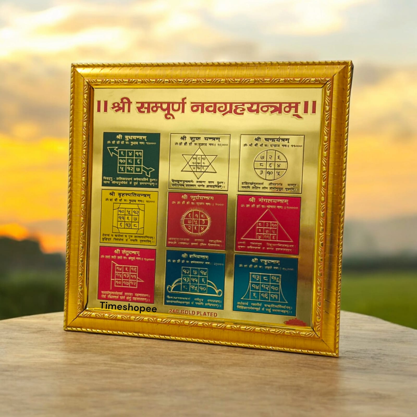 24K gold plated Shri Sampoorna Navgrah Yantra in a wooden frame, ideal for wall hanging and divine blessings.