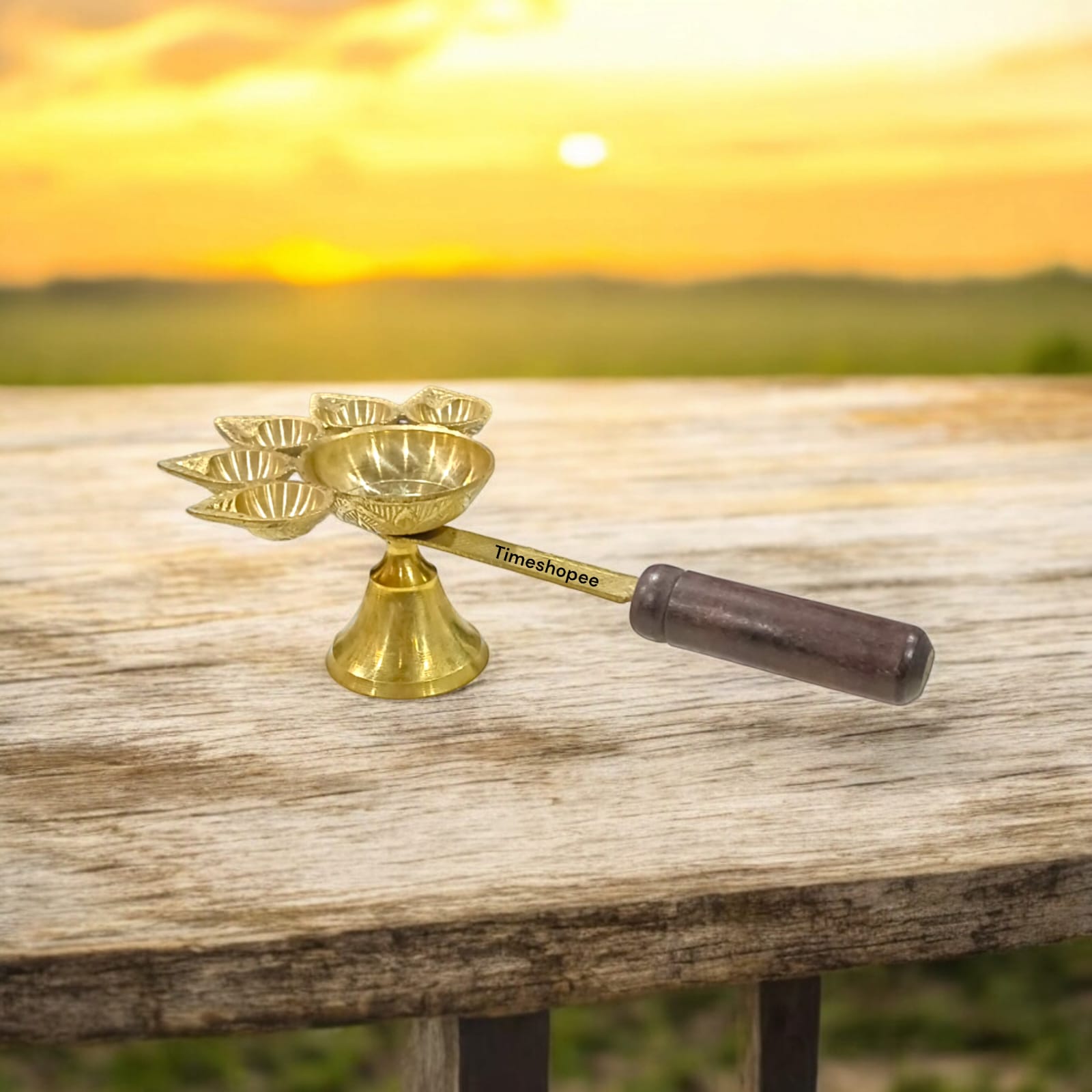 5-face brass Panch Mukhi Jyot with handle, ideal for Aarti, featuring an elegant finish, available at Timeshopee.