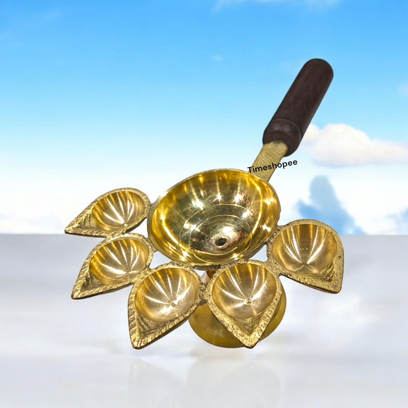 5-face brass Panch Mukhi Jyot with handle, ideal for Aarti, featuring an elegant finish, available at Timeshopee.