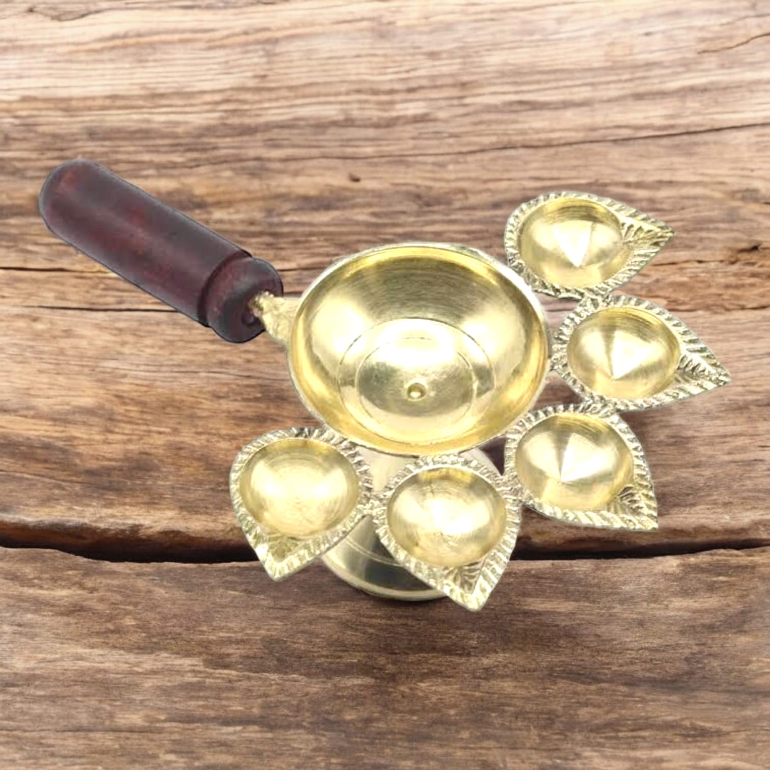 5-face brass Panch Mukhi Jyot with handle, ideal for Aarti, featuring an elegant finish, available at Timeshopee.