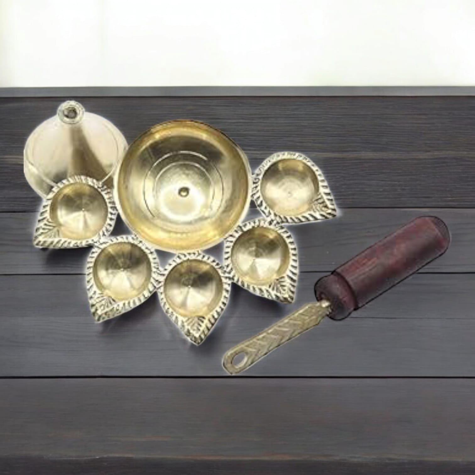 5-face brass Panch Mukhi Jyot with handle, ideal for Aarti, featuring an elegant finish, available at Timeshopee.