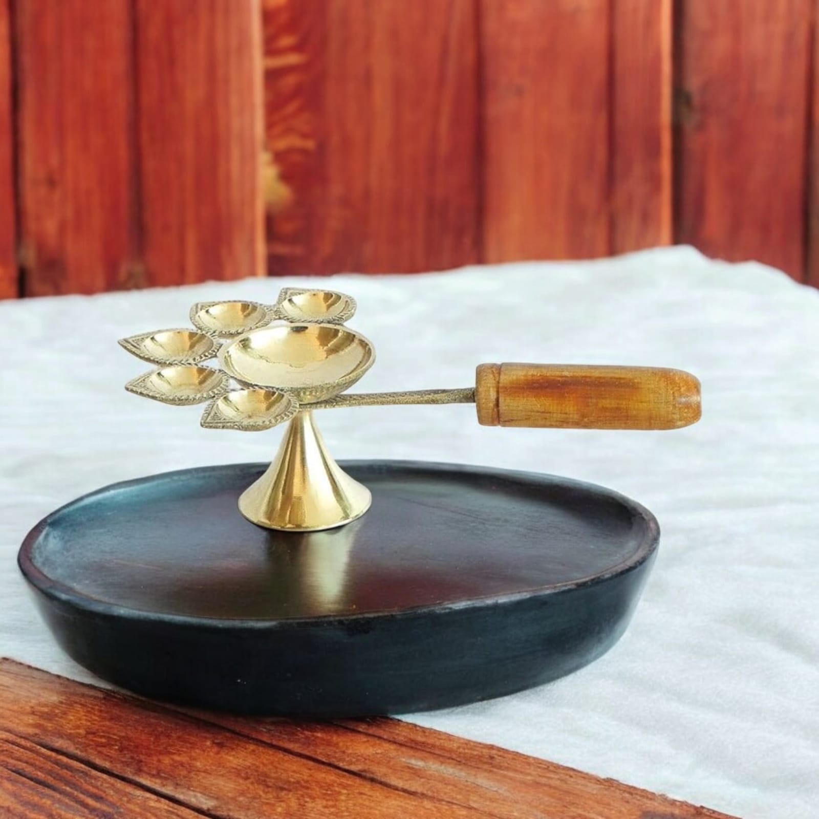 5-face brass Panch Mukhi Jyot with handle, ideal for Aarti, featuring an elegant finish, available at Timeshopee.