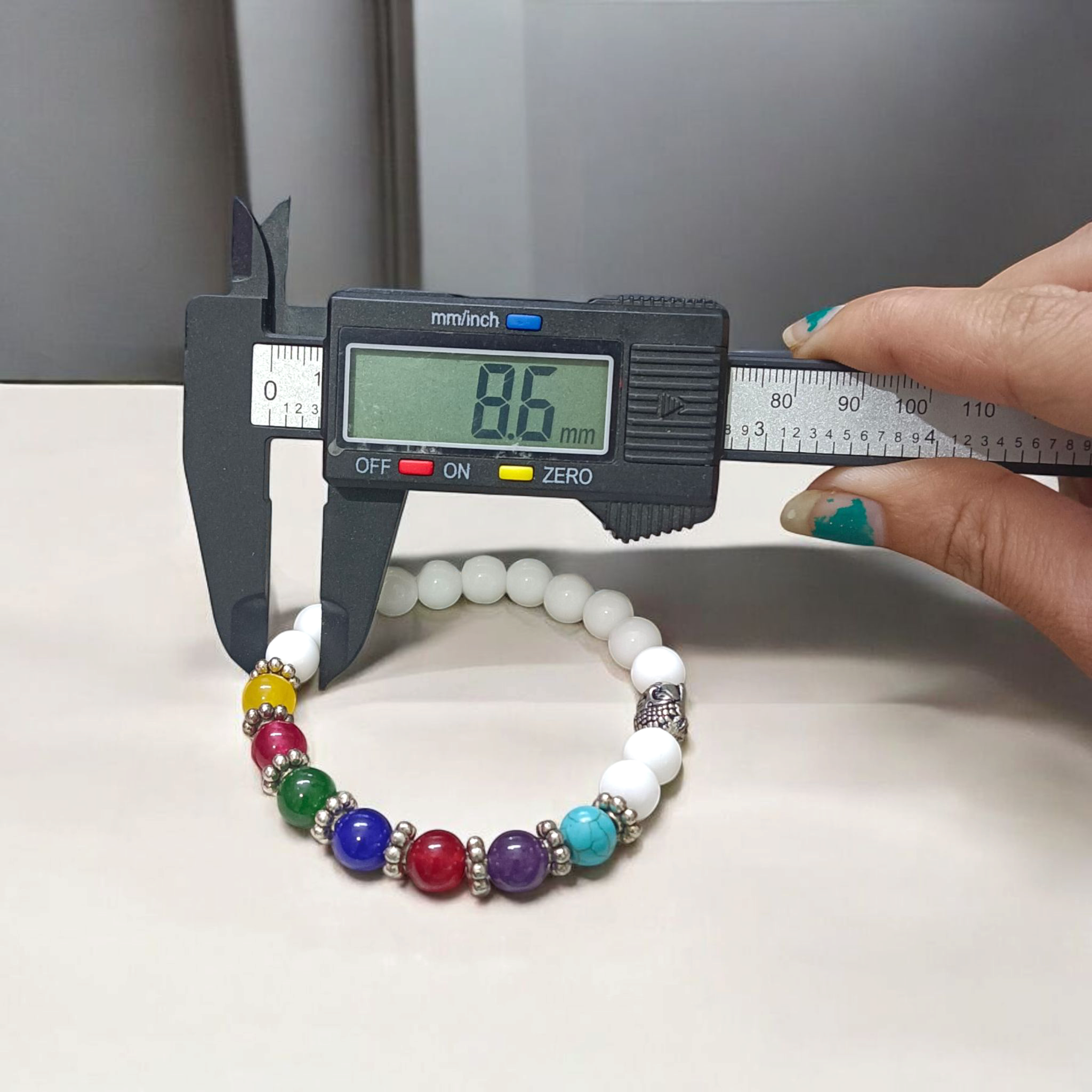 7 Chakra with Howlite Bracelet featuring colorful chakra stones and white howlite beads on an elastic thread, spiritual jewelry for men and women