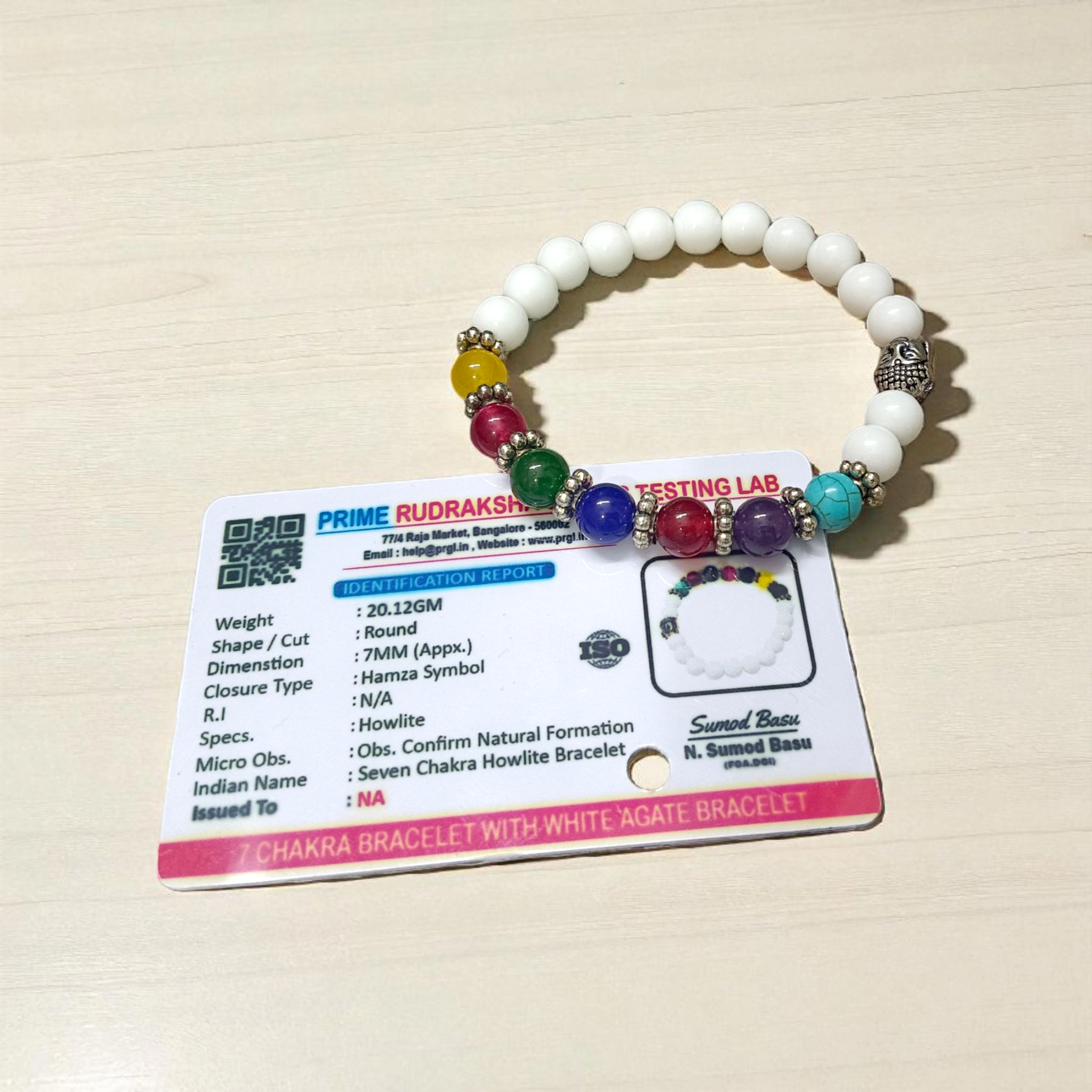 7 Chakra with Howlite Bracelet featuring colorful chakra stones and white howlite beads on an elastic thread, spiritual jewelry for men and women