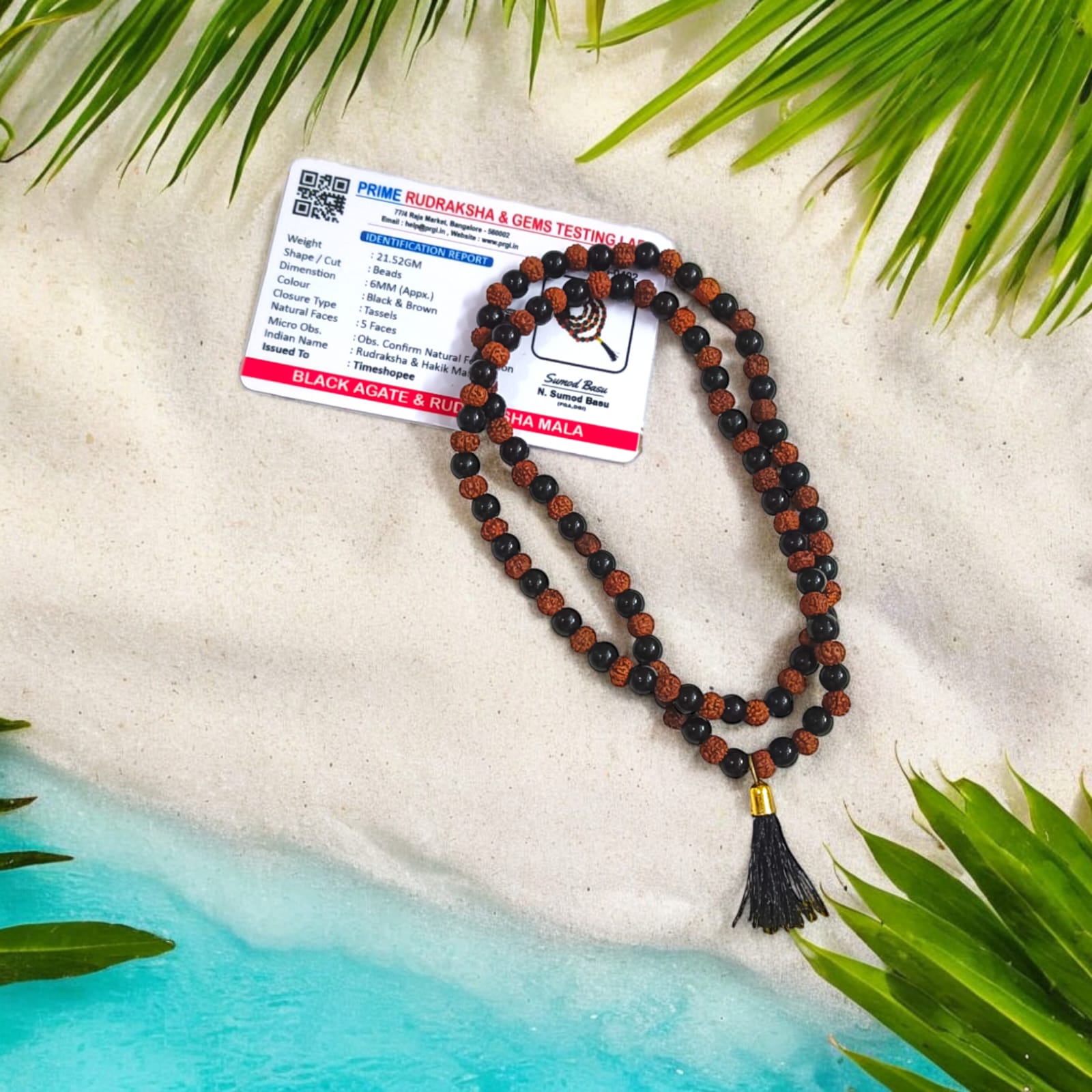 A Black Agate and Rudraksha Mala with 108+1 beads, each bead 6MM in size. Perfect for mantra chanting and daily wear, the mala offers spiritual energy and protection.