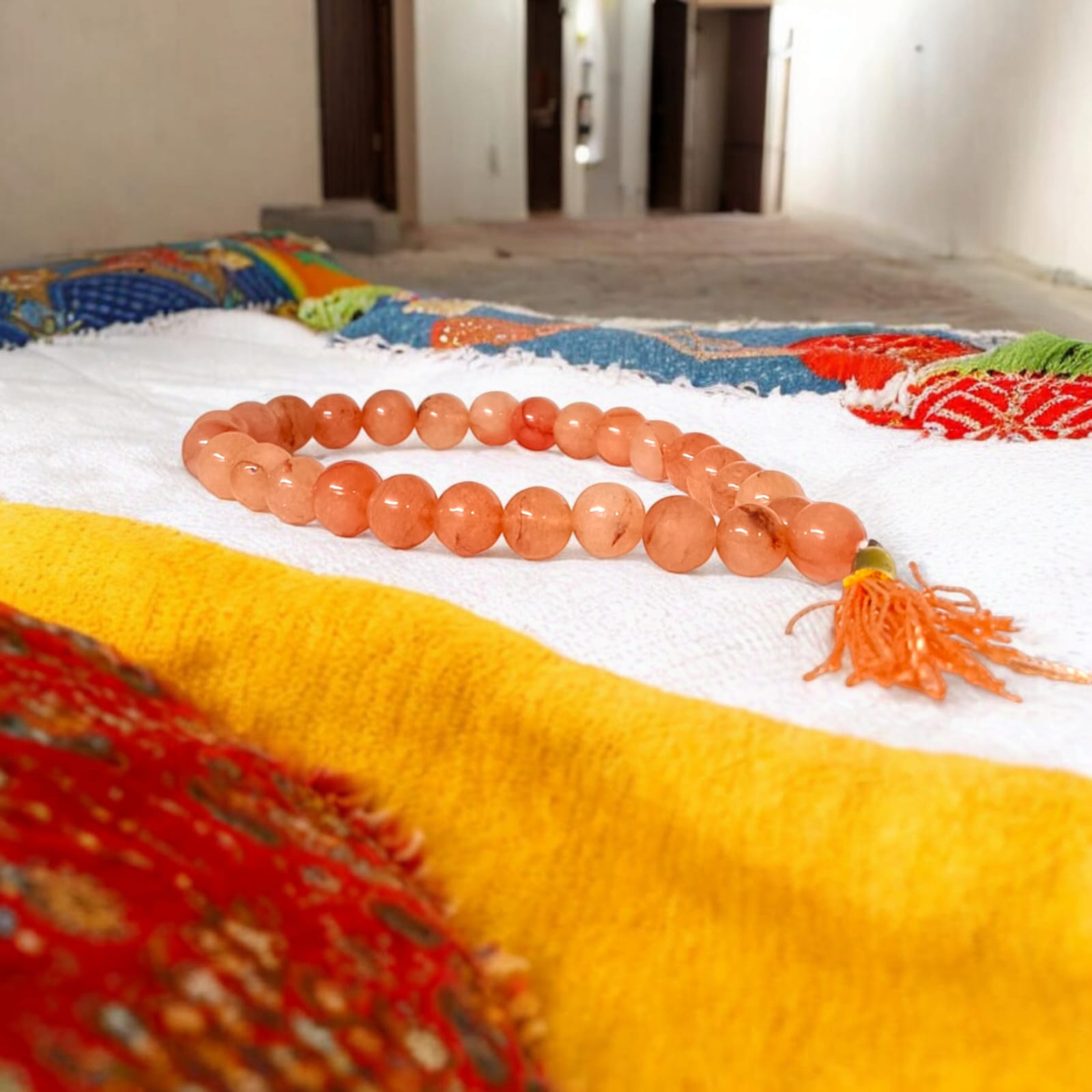 A Hessonite (Gomed) Mala with 27+1 lab-certified deep red gemstone beads, each 8MM in size, designed for meditation, focus, and astrological benefits, ideal for travel, office, and car.