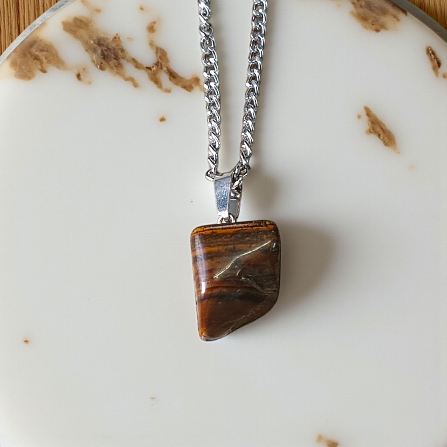 Lab-certified Tiger Eye Pendant with chain, featuring a golden-brown gemstone known for its grounding and protective properties