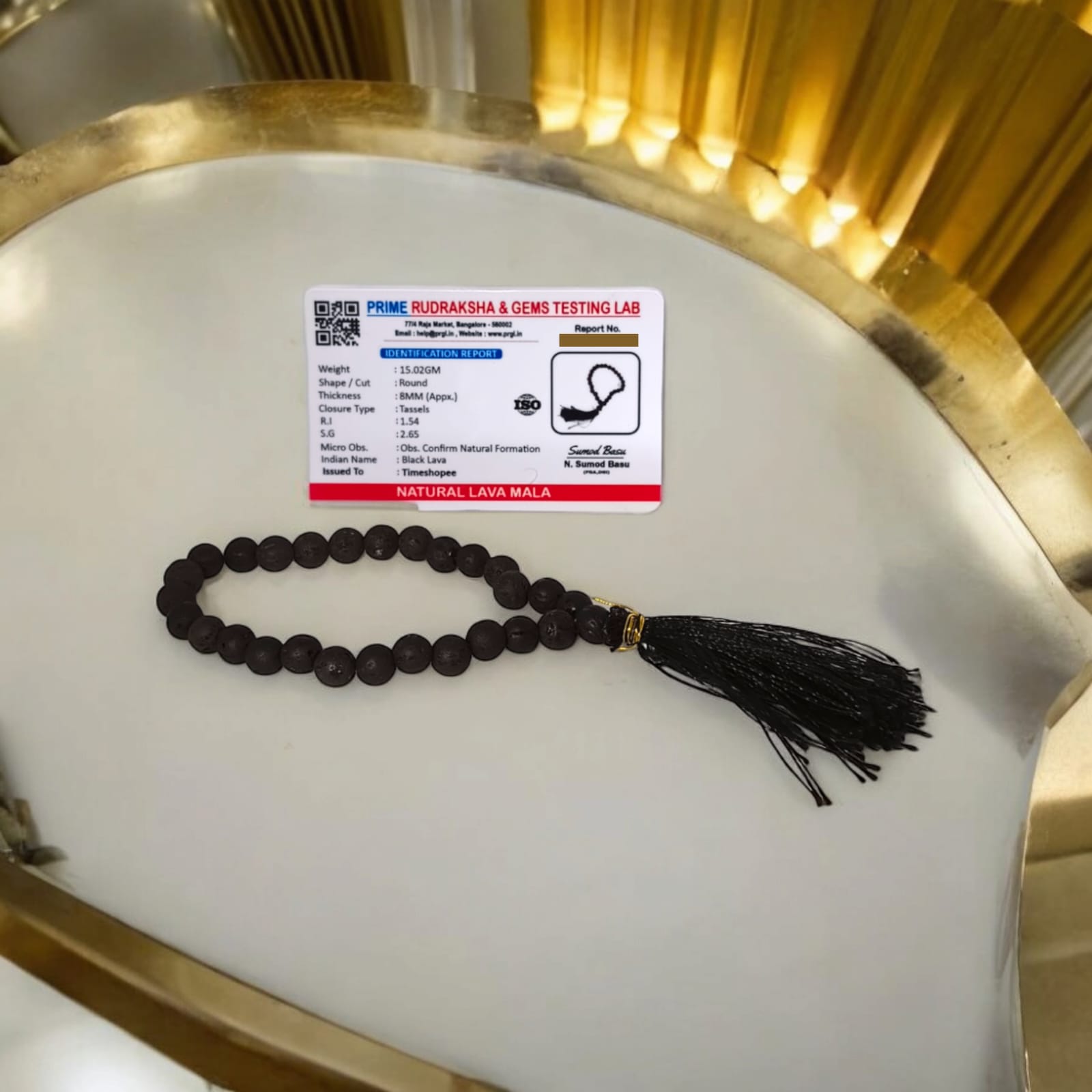 A Natural Lava Mala with 27+1 lab-certified black lava stone beads, each 8MM in size, perfect for grounding energy, meditation, and aromatherapy, suitable for car, office, and travel.