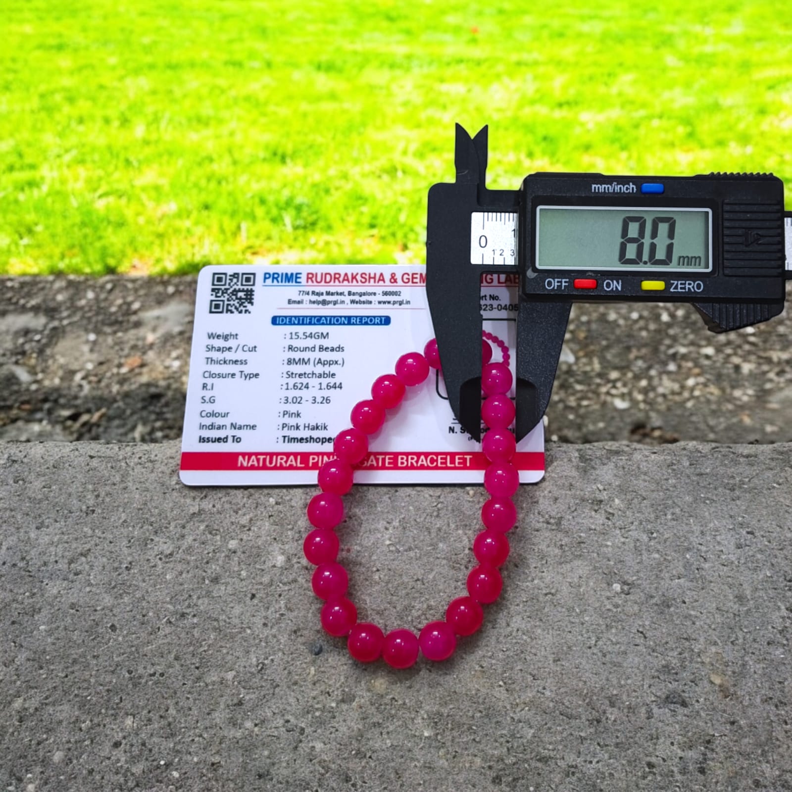 A Pink Agate Bracelet with 8MM lab-certified beads, designed in a stretchable style, offering elegance and spiritual balance.