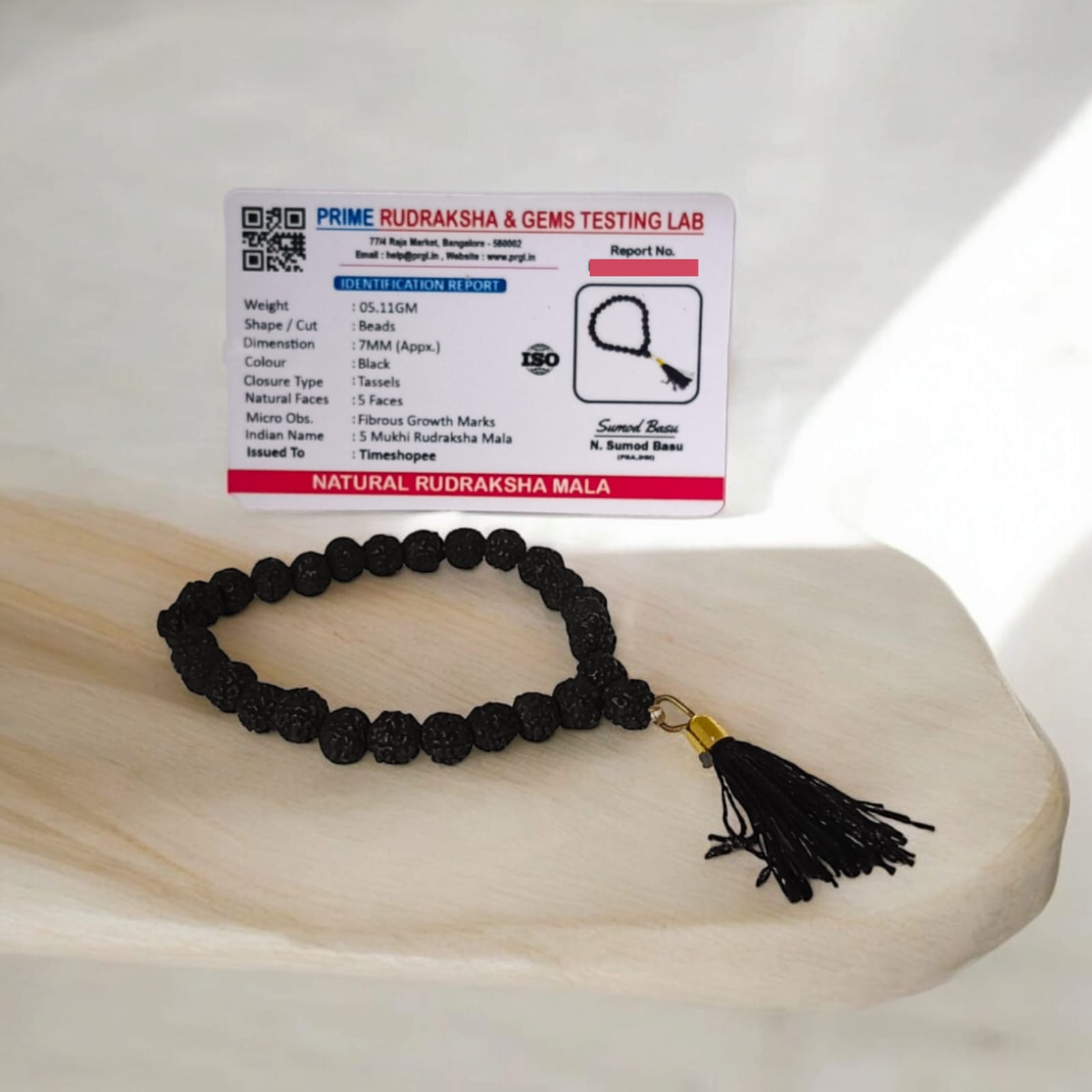 A 27+1 bead Black Rudraksha Mala with 7MM-sized beads, elegantly designed for spiritual use. Suitable for car, office, or travel, the lab-certified beads offer protection and a calming influence.