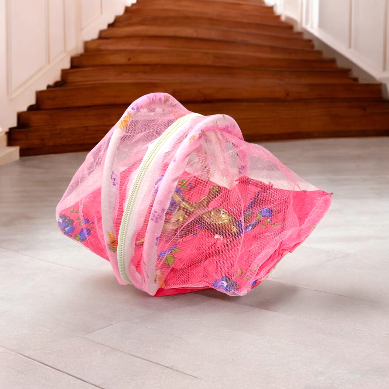 A beautiful 7X10 inch comfortable bed with a mosquito net and three pillows, designed for Laddu Gopal or Radha Rani, available in five vibrant colors for temple use.