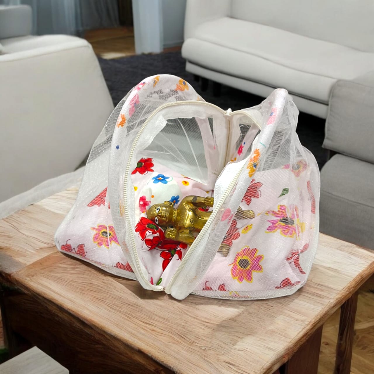 A beautiful 7X10 inch comfortable bed with a mosquito net and three pillows, designed for Laddu Gopal or Radha Rani, available in five vibrant colors for temple use.