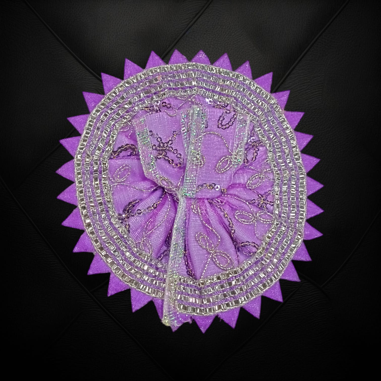 A beautiful Laddu Gopal dress featuring a zig zag border design, crafted for Size 2 Lord Krishna idols, perfect for poojas and festivals.