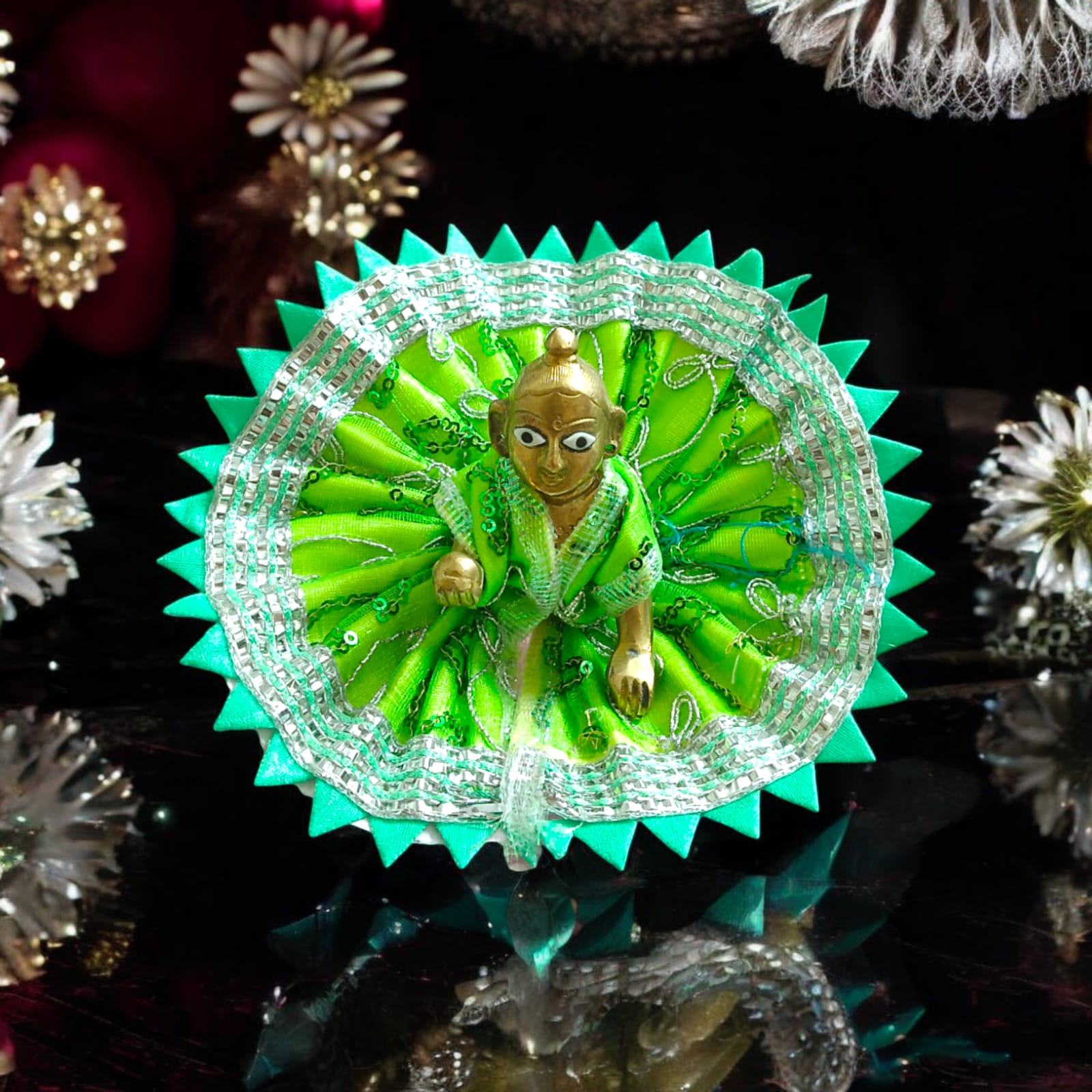 A beautiful Laddu Gopal dress featuring a zig zag border design, crafted for Size 2 Lord Krishna idols, perfect for poojas and festivals.