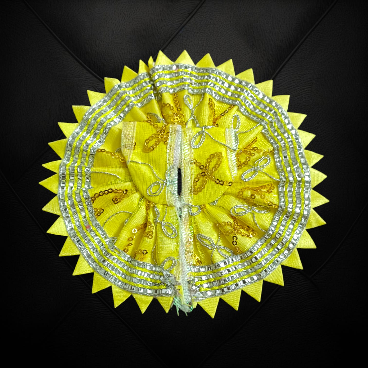 A beautiful Laddu Gopal dress featuring a zig zag border design, crafted for Size 2 Lord Krishna idols, perfect for poojas and festivals.