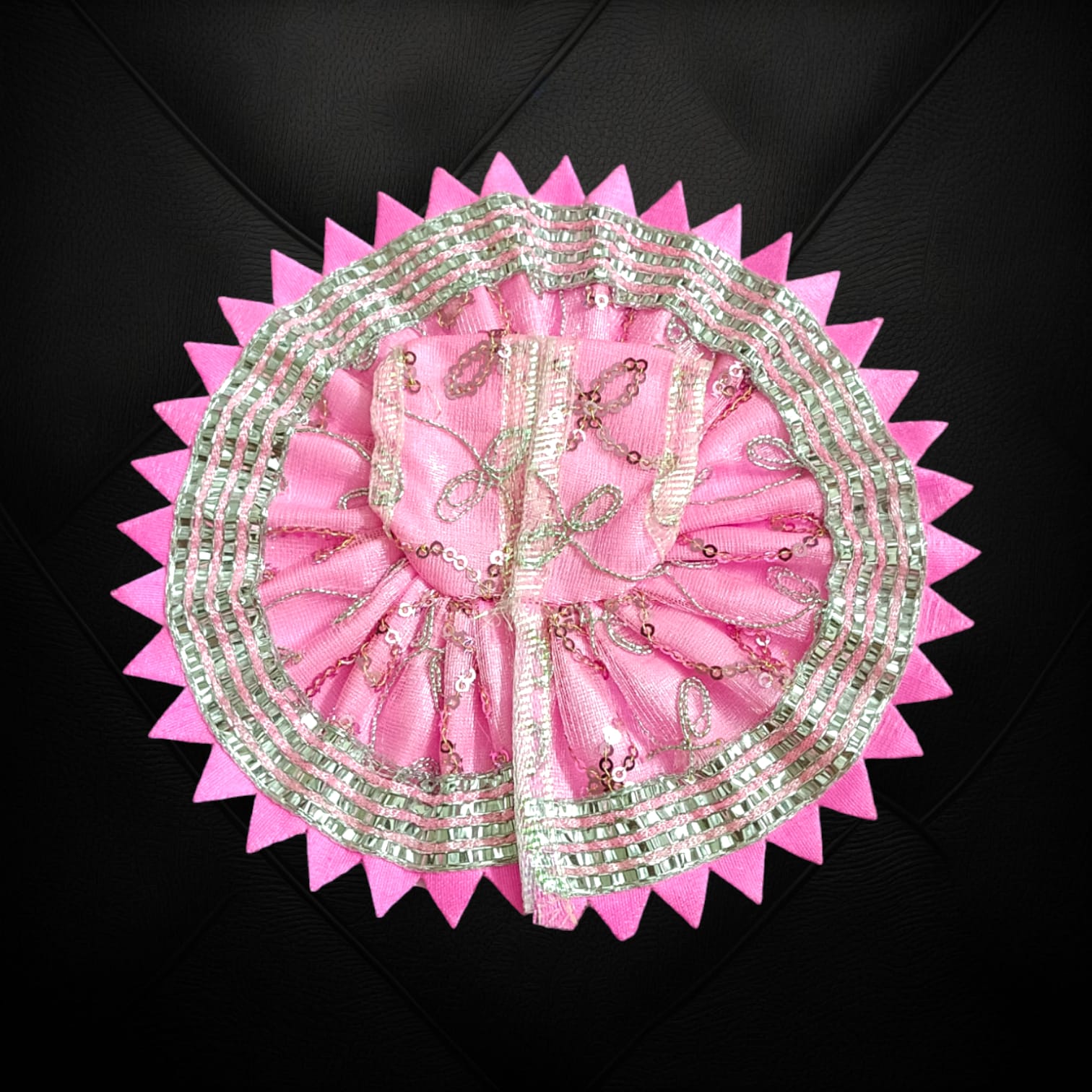 A beautiful Laddu Gopal dress featuring a zig zag border design, crafted for Size 2 Lord Krishna idols, perfect for poojas and festivals.