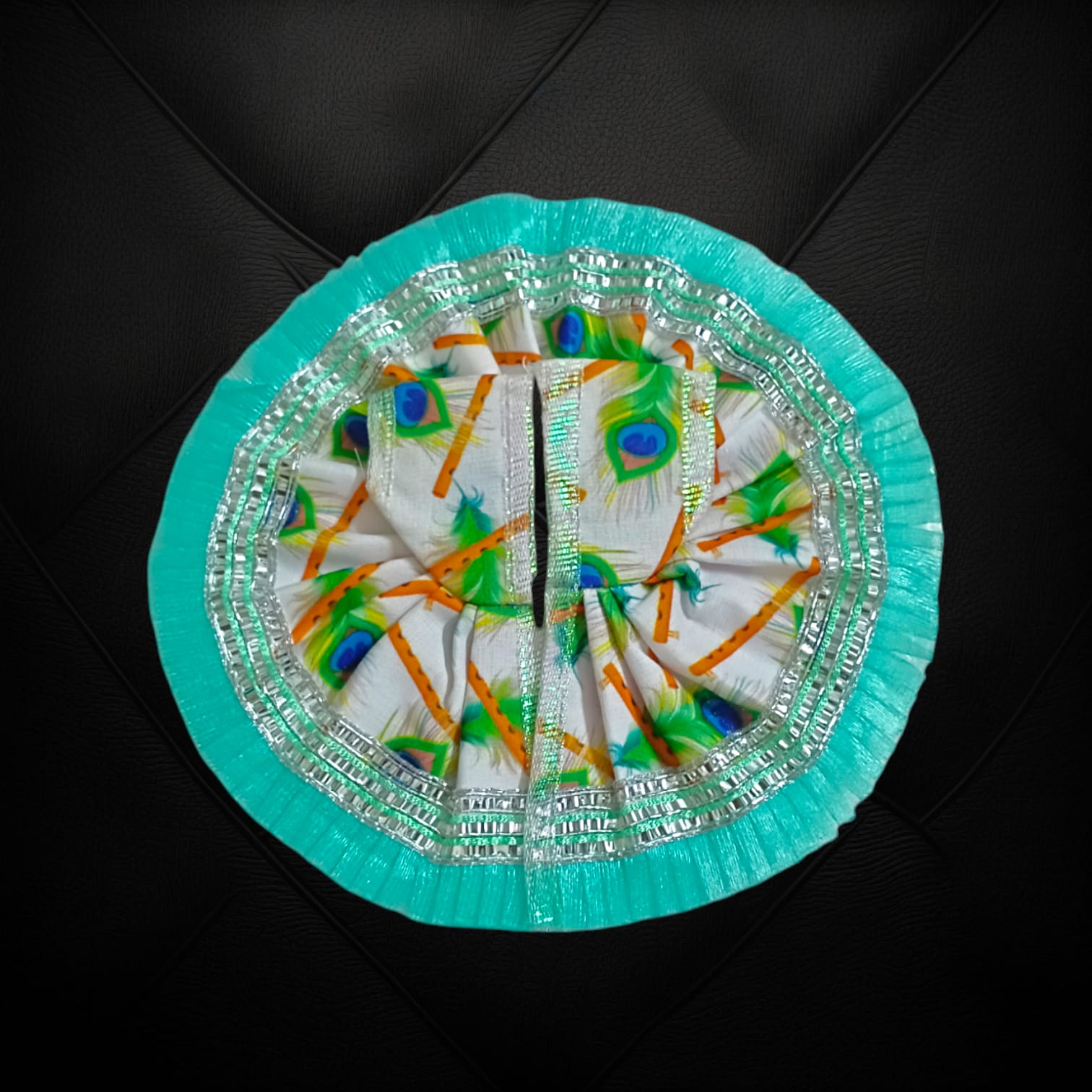 A beautiful Laddu Gopal dress with a stylish lace border, designed for Size 3 Laddu Gopal Ji, perfect for daily worship or festive occasions.