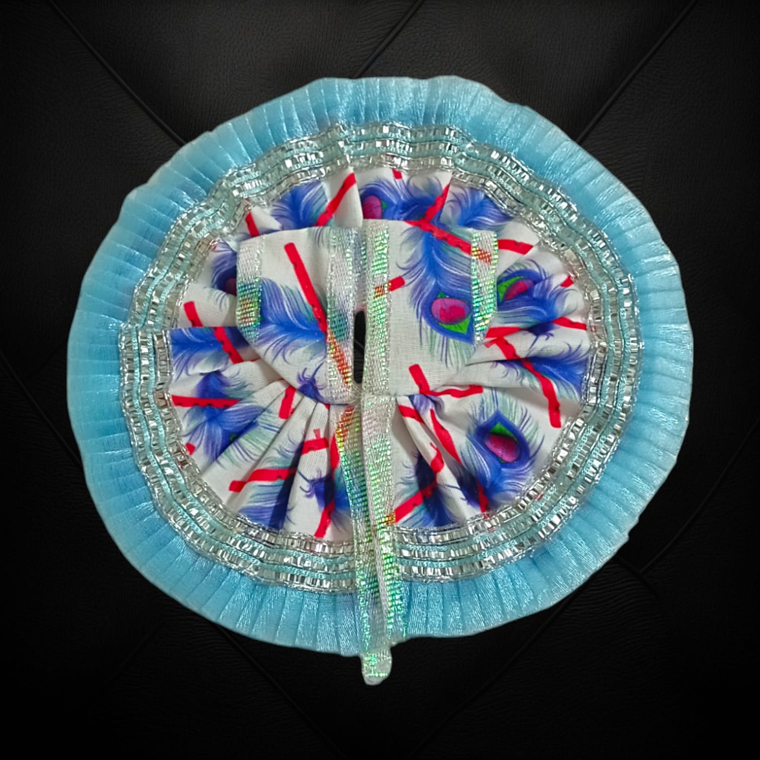 A beautiful Laddu Gopal dress with a stylish lace border, designed for Size 3 Laddu Gopal Ji, perfect for daily worship or festive occasions.