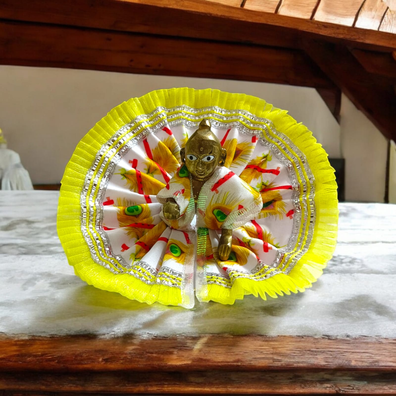 A beautiful Laddu Gopal dress with a stylish lace border, designed for Size 3 Laddu Gopal Ji, perfect for daily worship or festive occasions.