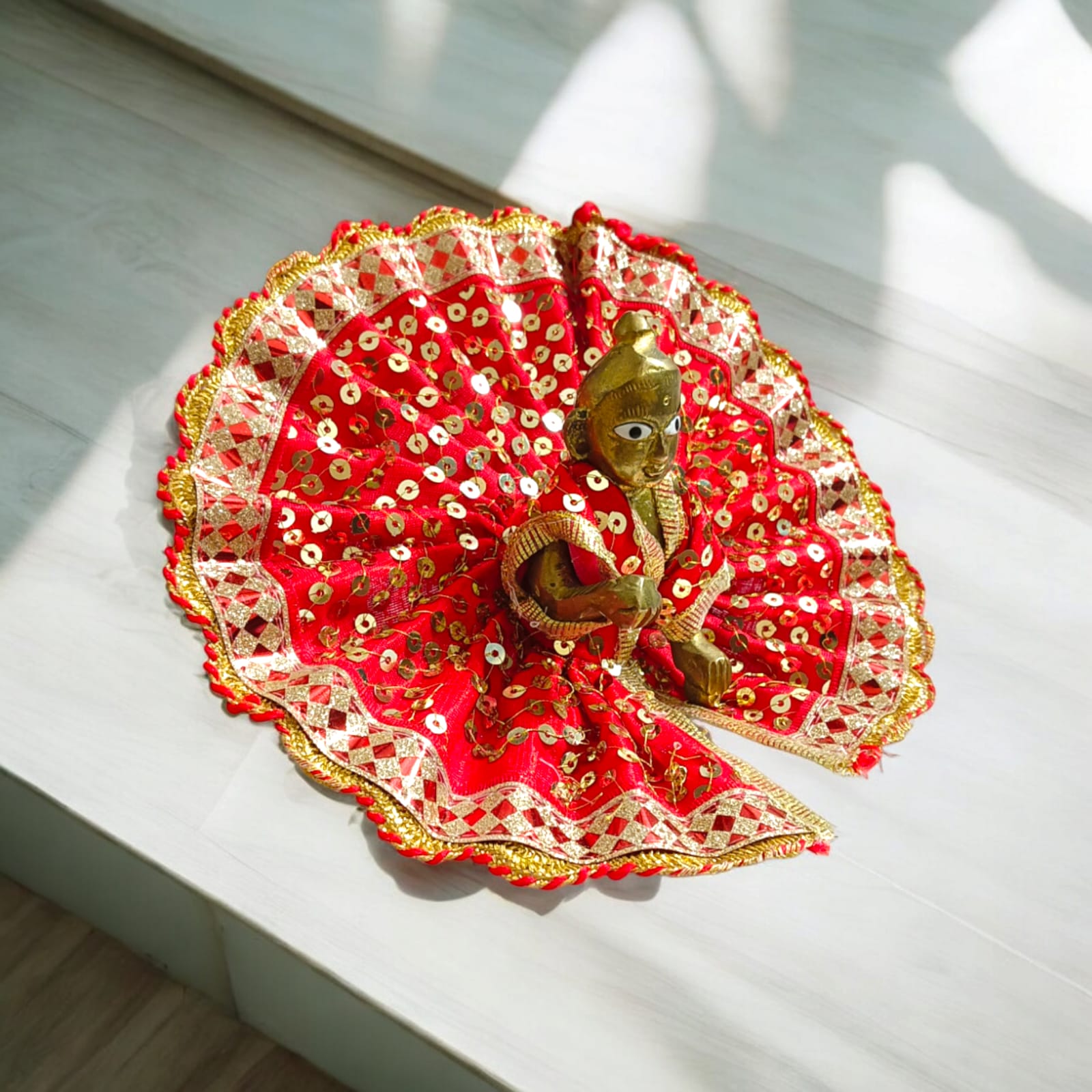 A beautiful Laddu Gopal dress with intricate embroidery, specially designed for Size 3 Laddu Gopal Ji, perfect for pooja functions and festive ceremonies.