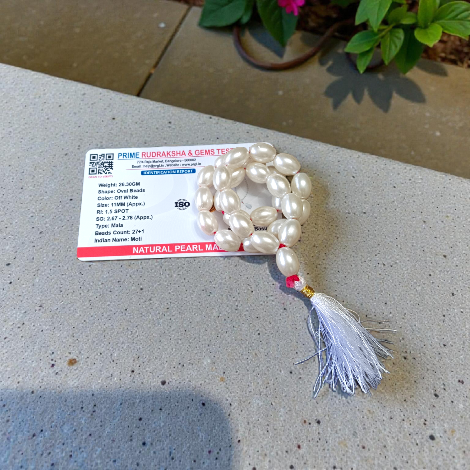 A beautiful Natural Pearl Mala with 108+1 white round beads (10-11mm), handcrafted and lab-certified, ideal for meditation and Japa rituals