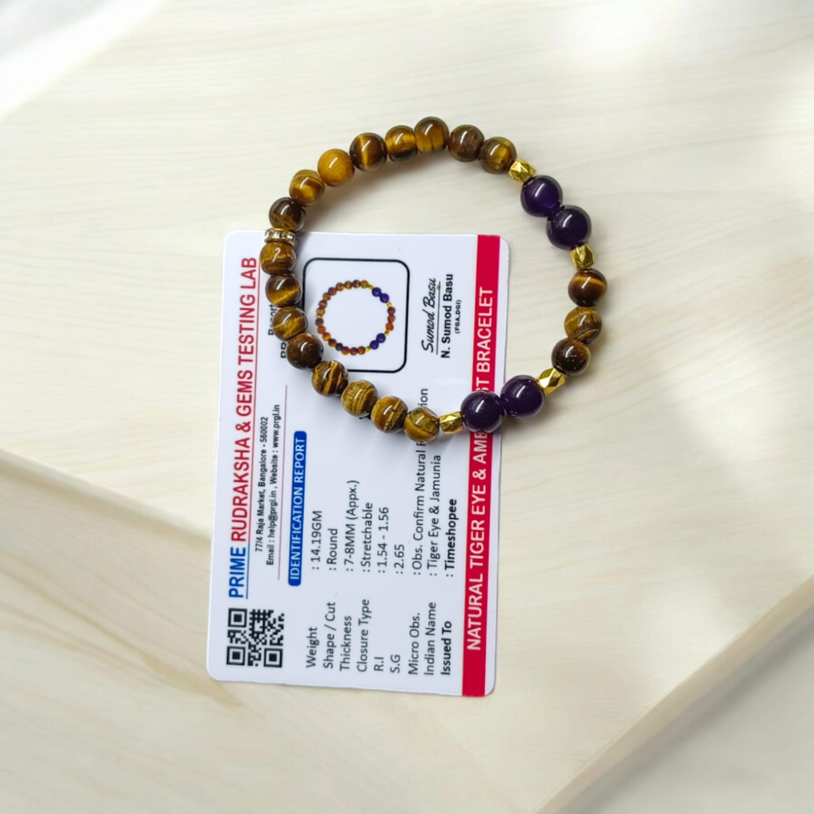 A beautiful Tiger Eye & Amethyst bracelet with 8MM lab-certified natural beads designed to increase courage, confidence, and mental clarity.