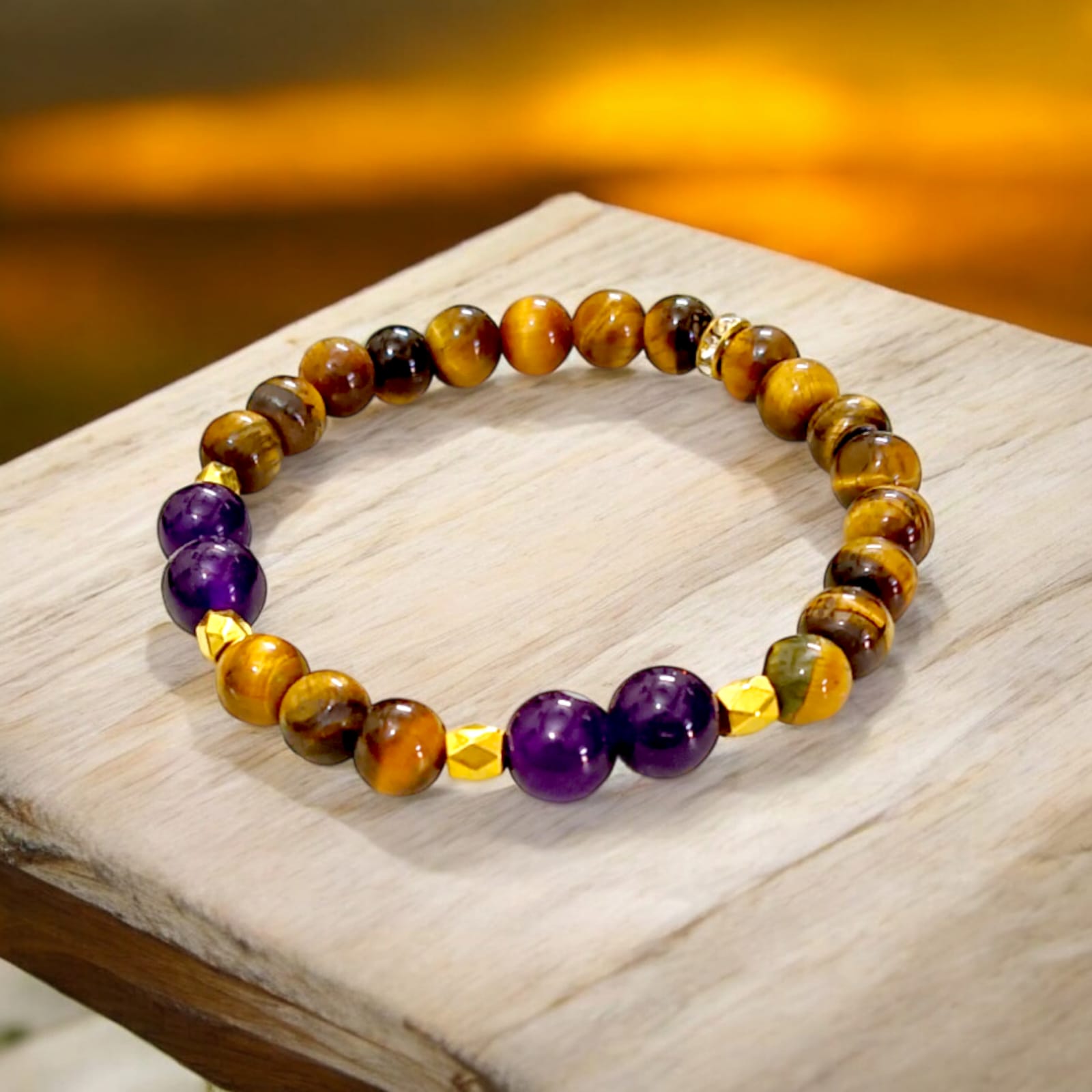 A beautiful Tiger Eye & Amethyst bracelet with 8MM lab-certified natural beads designed to increase courage, confidence, and mental clarity.