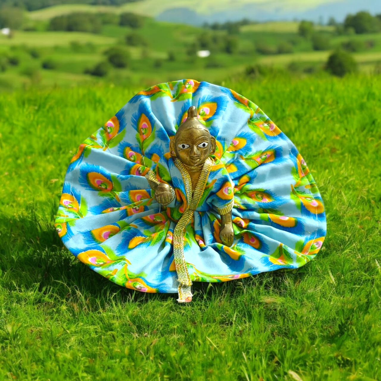 A beautiful cotton Laddu Gopal dress with floral designs, tailored for Size 4 Laddu Gopal Ji, perfect for worship and festive occasions.