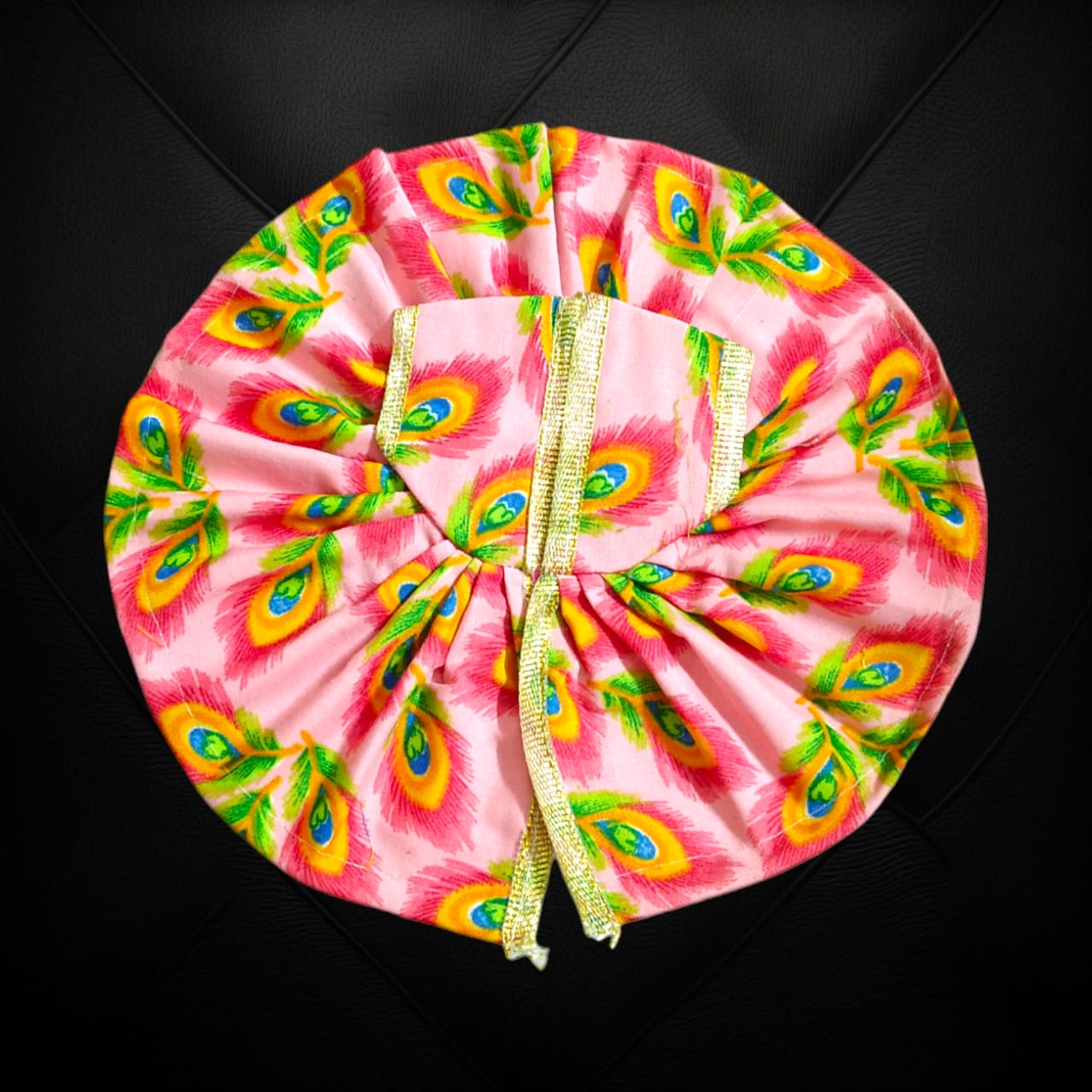 A beautiful cotton Laddu Gopal dress with floral designs, tailored for Size 4 Laddu Gopal Ji, perfect for worship and festive occasions.