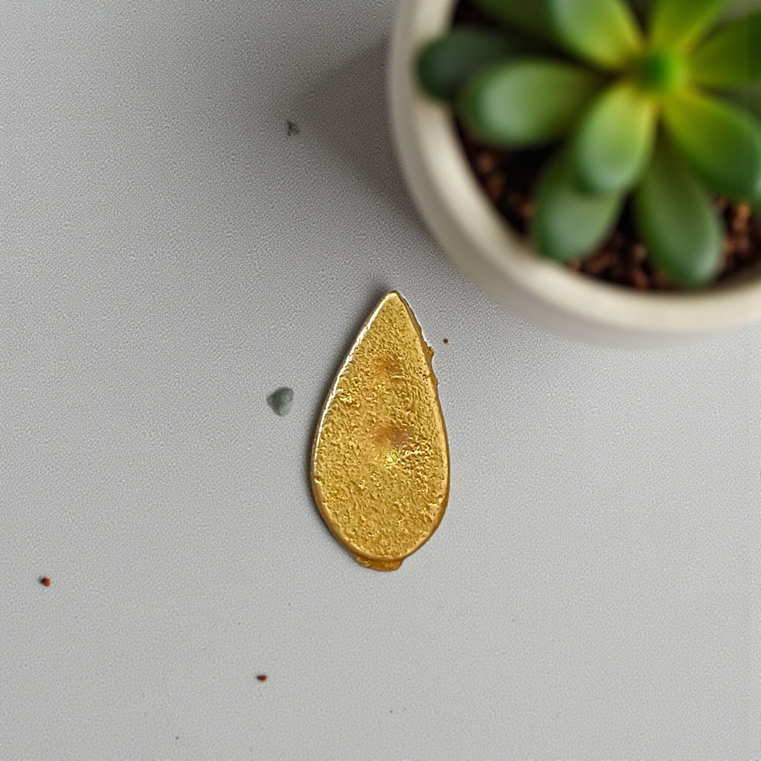 A beautifully crafted Prabhu Tilak Stamp designed for easy and sacred tilak application, shown with kumkum for spiritual rituals