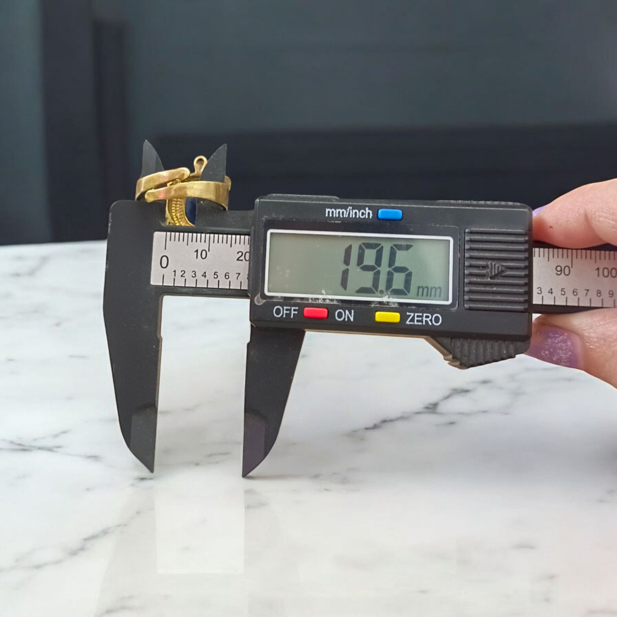 A close-up of the Kachua Black Hakik Ring, showcasing a deep black Kala Hakik (Black Agate) gemstone set in a tortoise-shaped design made from Ashtdhatu. The ring is adjustable and suitable for both men and women