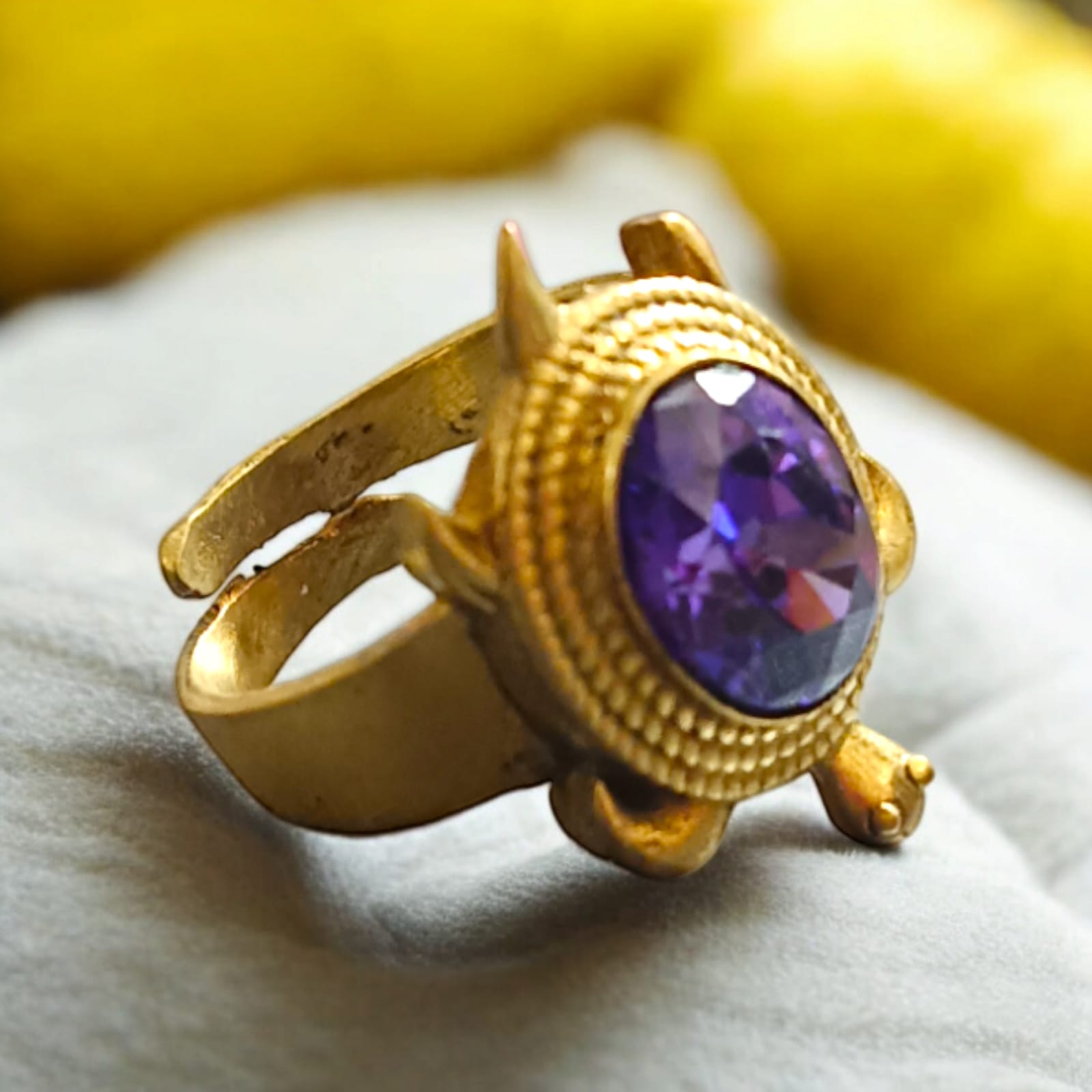 A close-up of the Kachua Jamunia Ring, featuring a purple Jamunia gemstone set in a tortoise-shaped design, made from Ashtdhatu. The ring is adjustable and designed for both men and women.