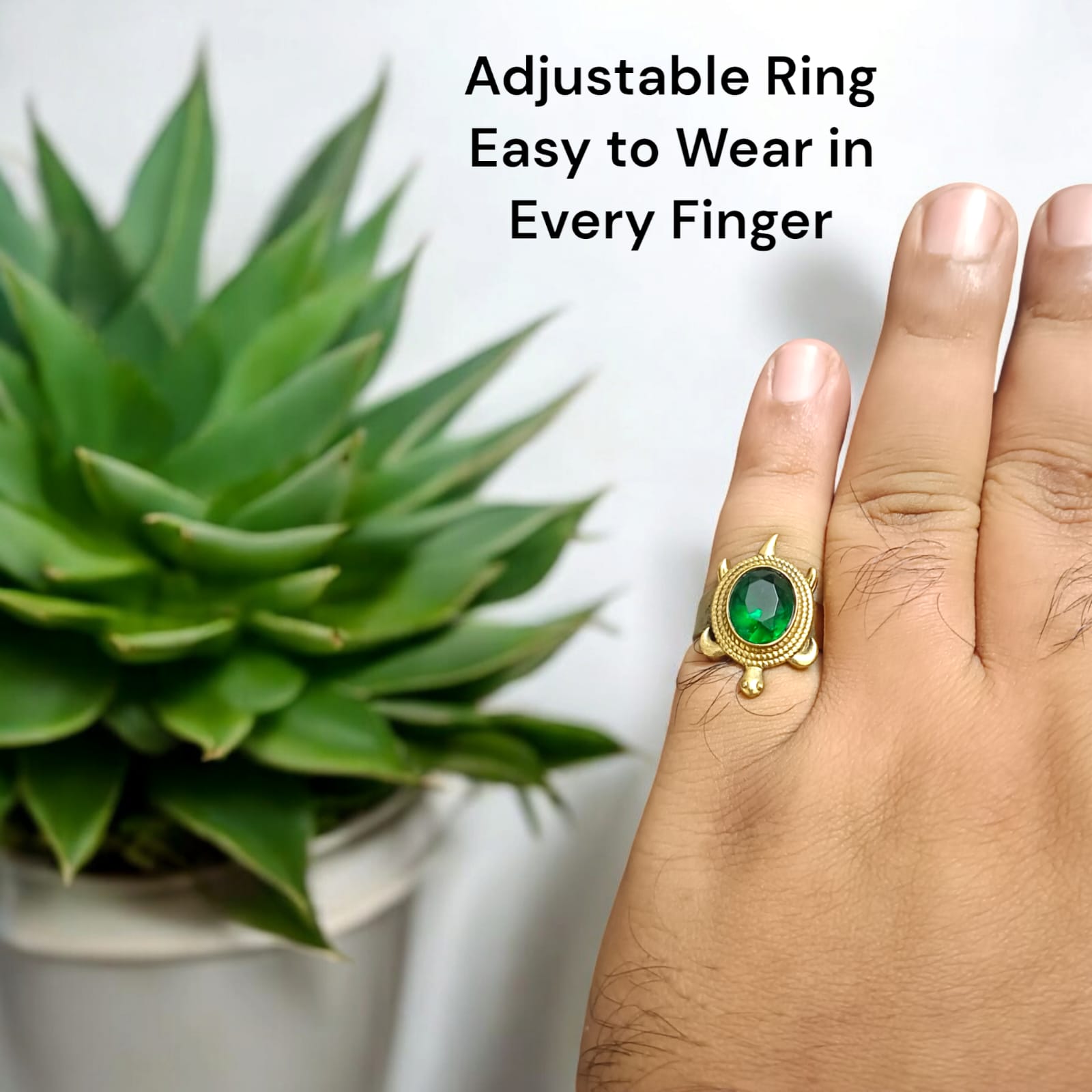 A close-up of the Kachua Panna Ring, featuring a green Panna gemstone set in a tortoise-shaped design made from Ashtdhatu. The ring is adjustable and suitable for men and women.