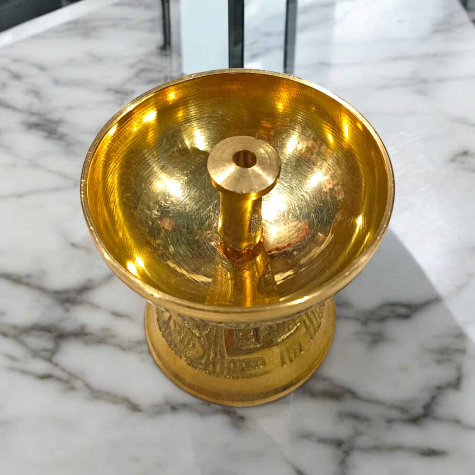 A compact 2x1.5-inch brass Akhand Jyot pooja lamp, ideal for aarti and daily rituals, with a traditional design and sturdy base.