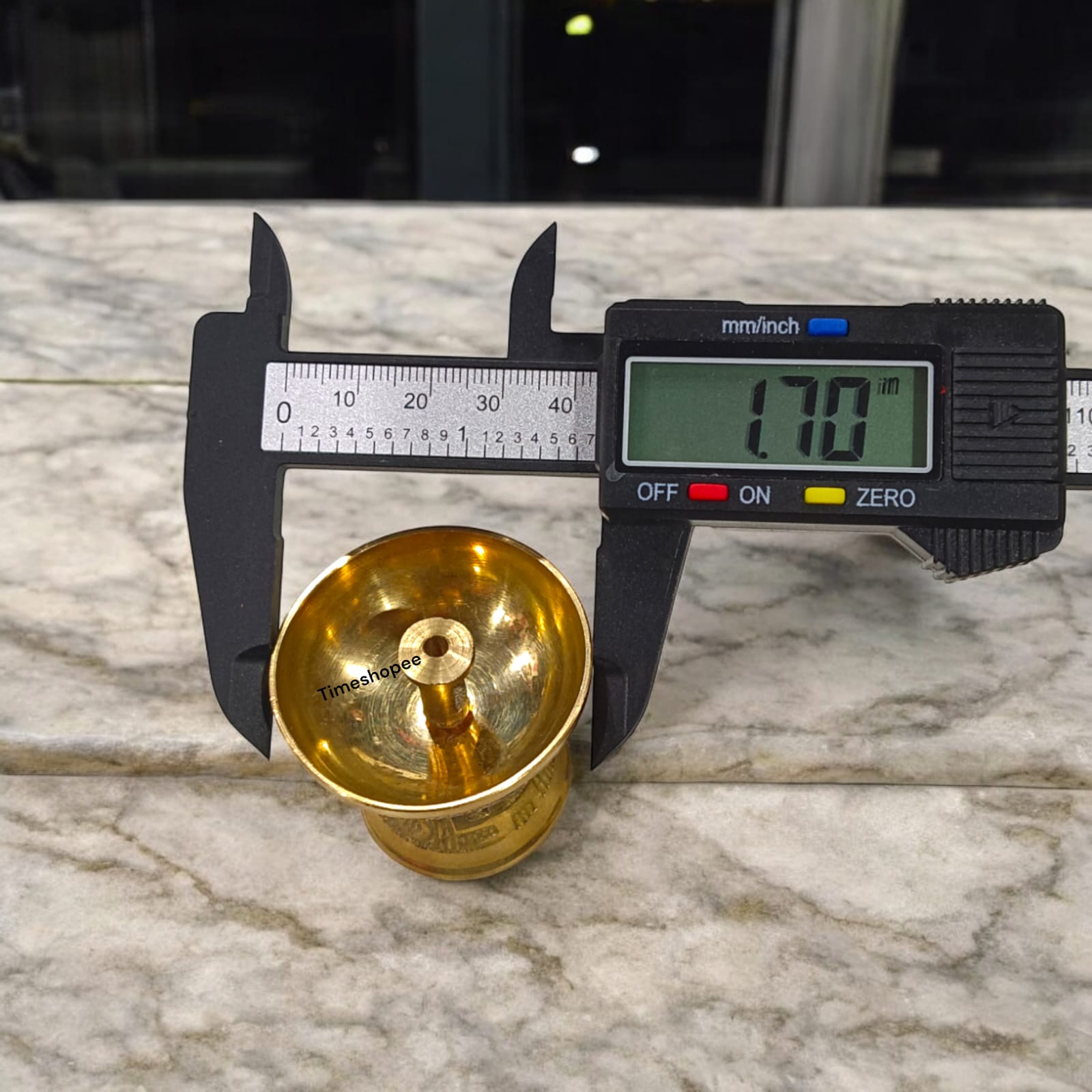 A compact 2x1.5-inch brass Akhand Jyot pooja lamp, ideal for aarti and daily rituals, with a traditional design and sturdy base.