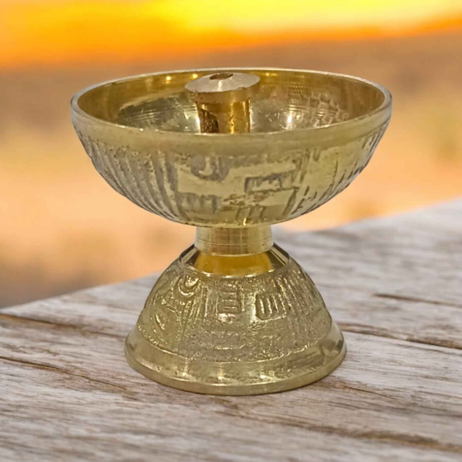 A compact 2x1.5-inch brass Akhand Jyot pooja lamp, ideal for aarti and daily rituals, with a traditional design and sturdy base.