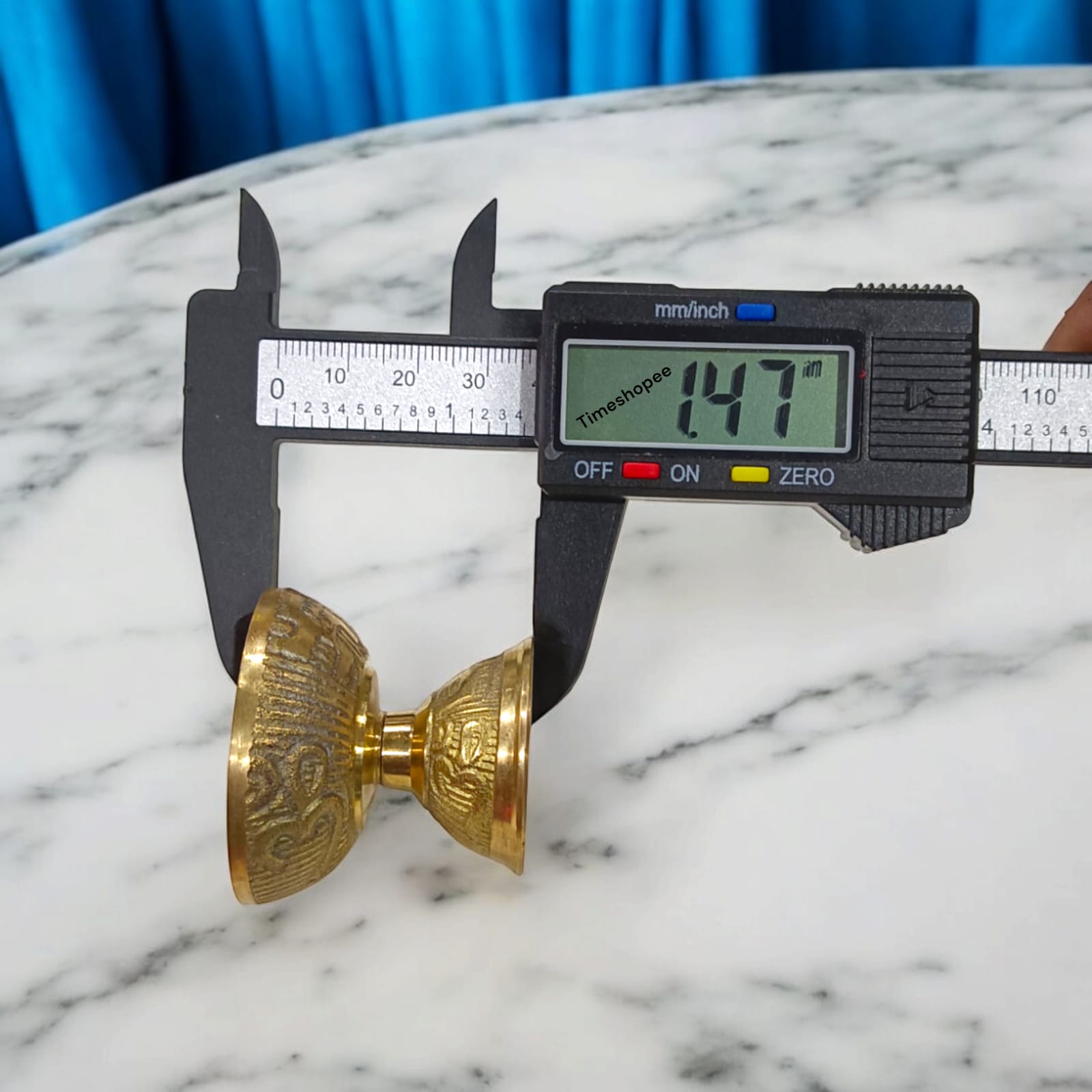 A compact 2x1.5-inch brass Akhand Jyot pooja lamp, ideal for aarti and daily rituals, with a traditional design and sturdy base.