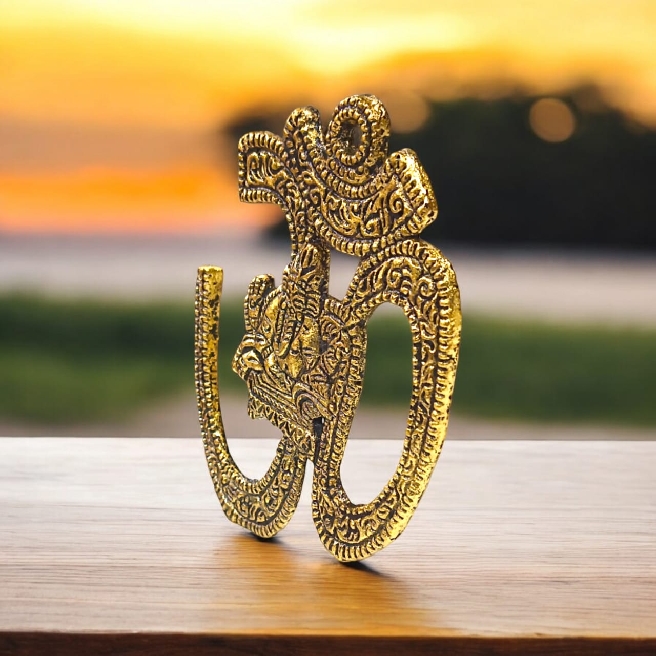 A decorative brass wall hanging featuring the sacred Om symbol, measuring 4X5 inches, suitable for temples, offices, and home walls to promote spirituality.