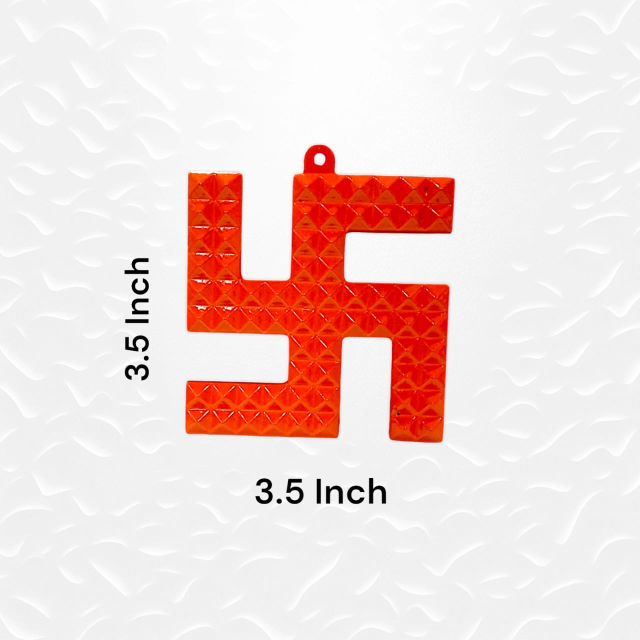 A decorative metal wall hanging featuring a Swastik and 68 Vaastu Pyramid, measuring 10X10 CM, suitable for hanging in temples, offices, and homes to promote positive energy.