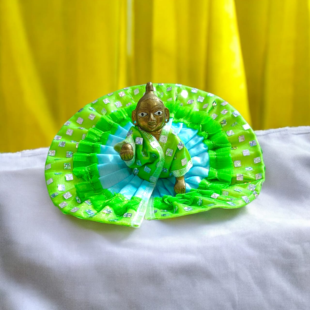 A designer satin and net Laddu Gopal dress, crafted for Size 4 Laddu Gopal Ji, perfect for special occasions and religious ceremonies.