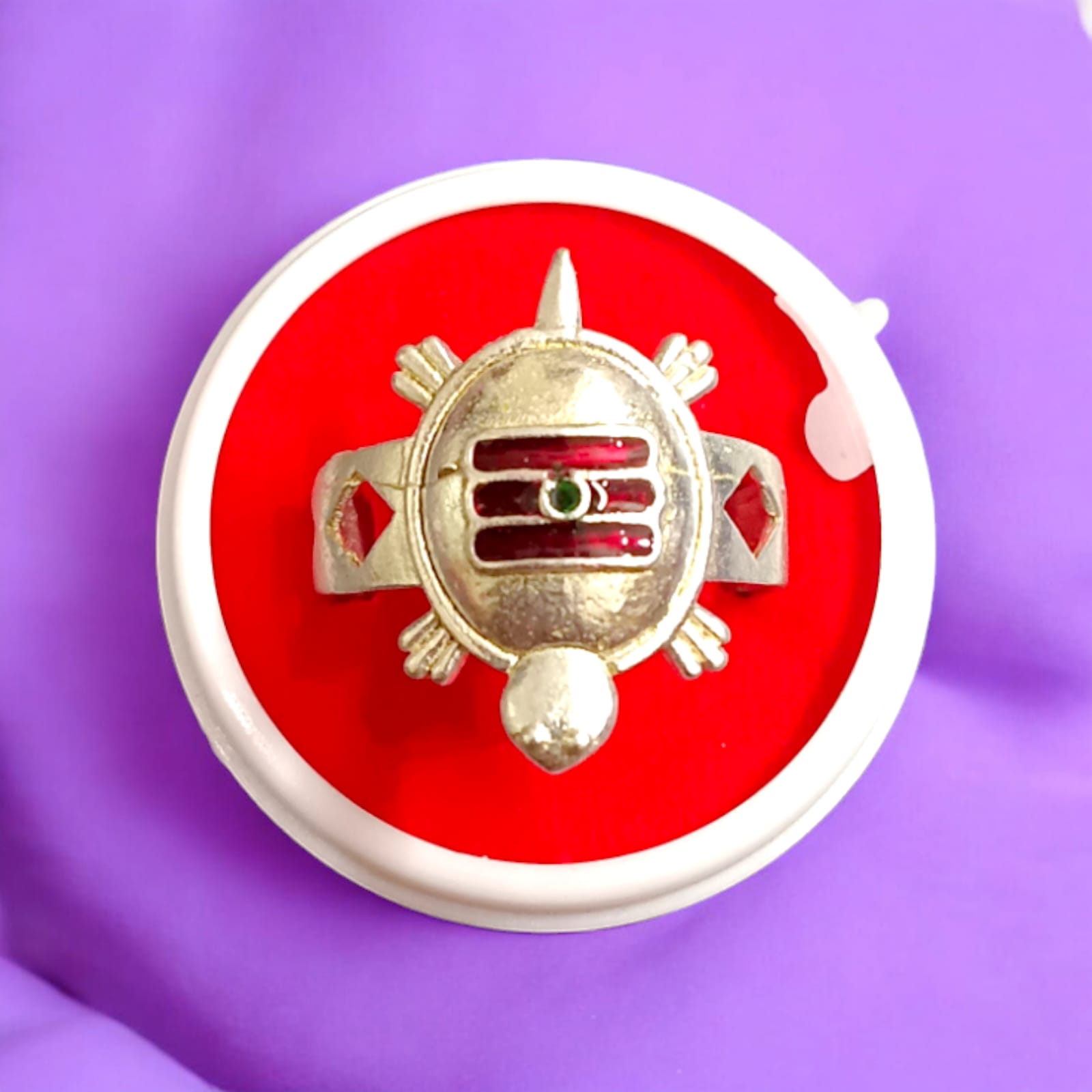 A detailed view of the Tripund Kachua Ring, featuring the Tripund symbol (three horizontal lines) on a silver-plated tortoise-shaped design. The ring is adjustable and suitable for both men and women.