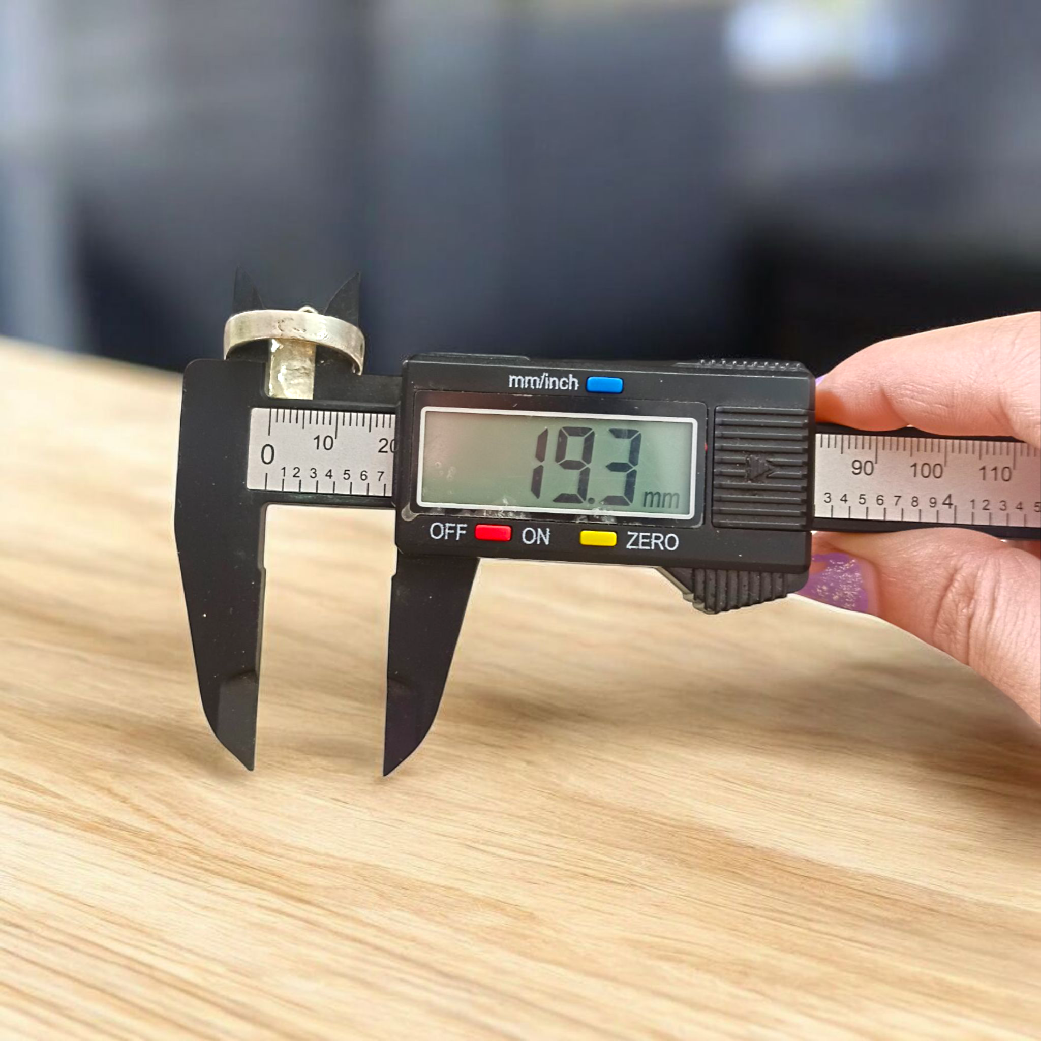 A detailed view of the Tripund Kachua Ring, featuring the Tripund symbol (three horizontal lines) on a silver-plated tortoise-shaped design. The ring is adjustable and suitable for both men and women