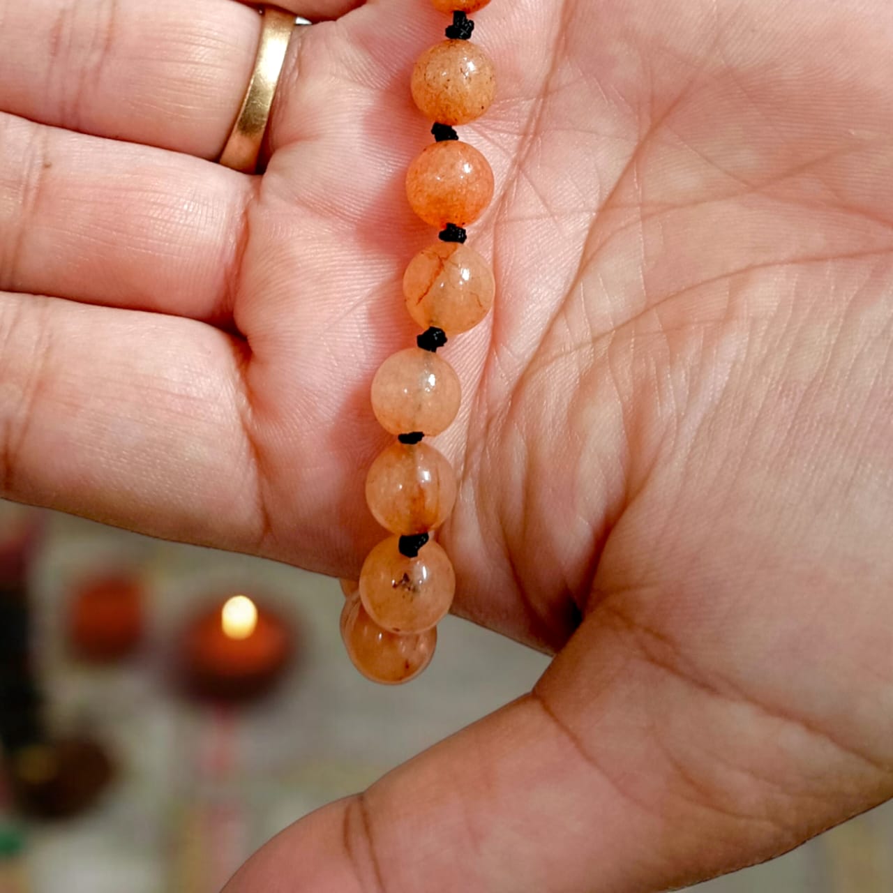 A lab-certified Hessonite (Gomed) bracelet with 8 MM beads and a sliding knot clasp for easy adjustment, offering spiritual protection and Rahu influence balance.