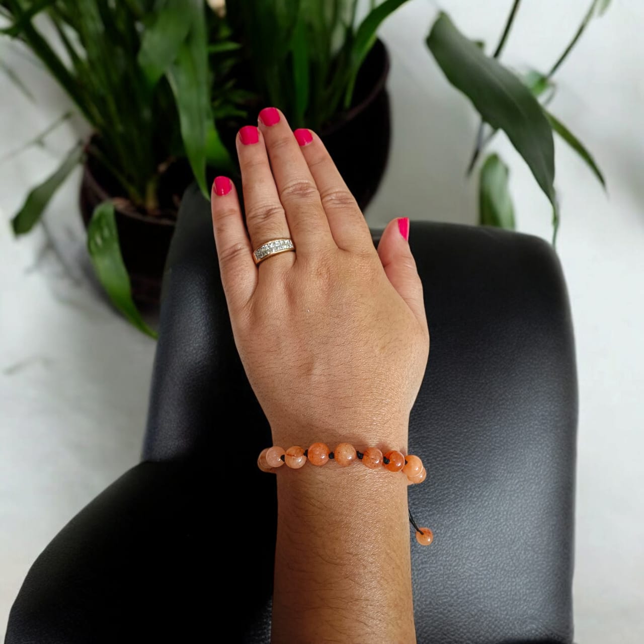 A lab-certified Hessonite (Gomed) bracelet with 8 MM beads and a sliding knot clasp for easy adjustment, offering spiritual protection and Rahu influence balance.