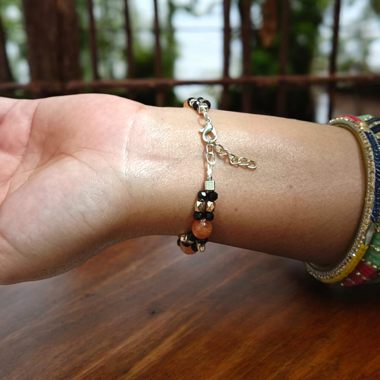 A lab-certified Hessonite (Gomed) bracelet with 8 MM beads and an adjustable lobster clasp, known for spiritual protection and Rahu's influence.