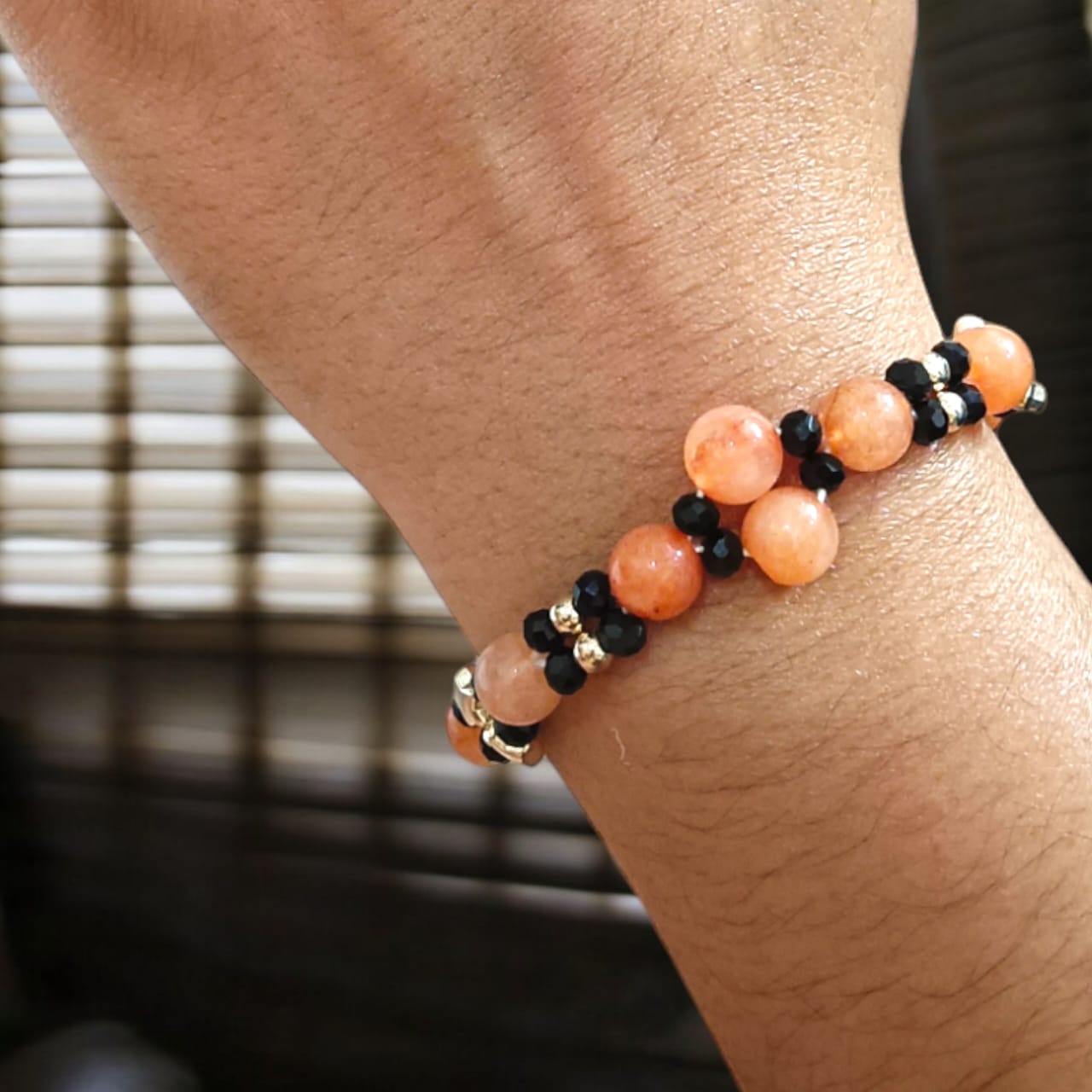 A lab-certified Hessonite (Gomed) bracelet with 8 MM beads and an adjustable lobster clasp, known for spiritual protection and Rahu's influence.