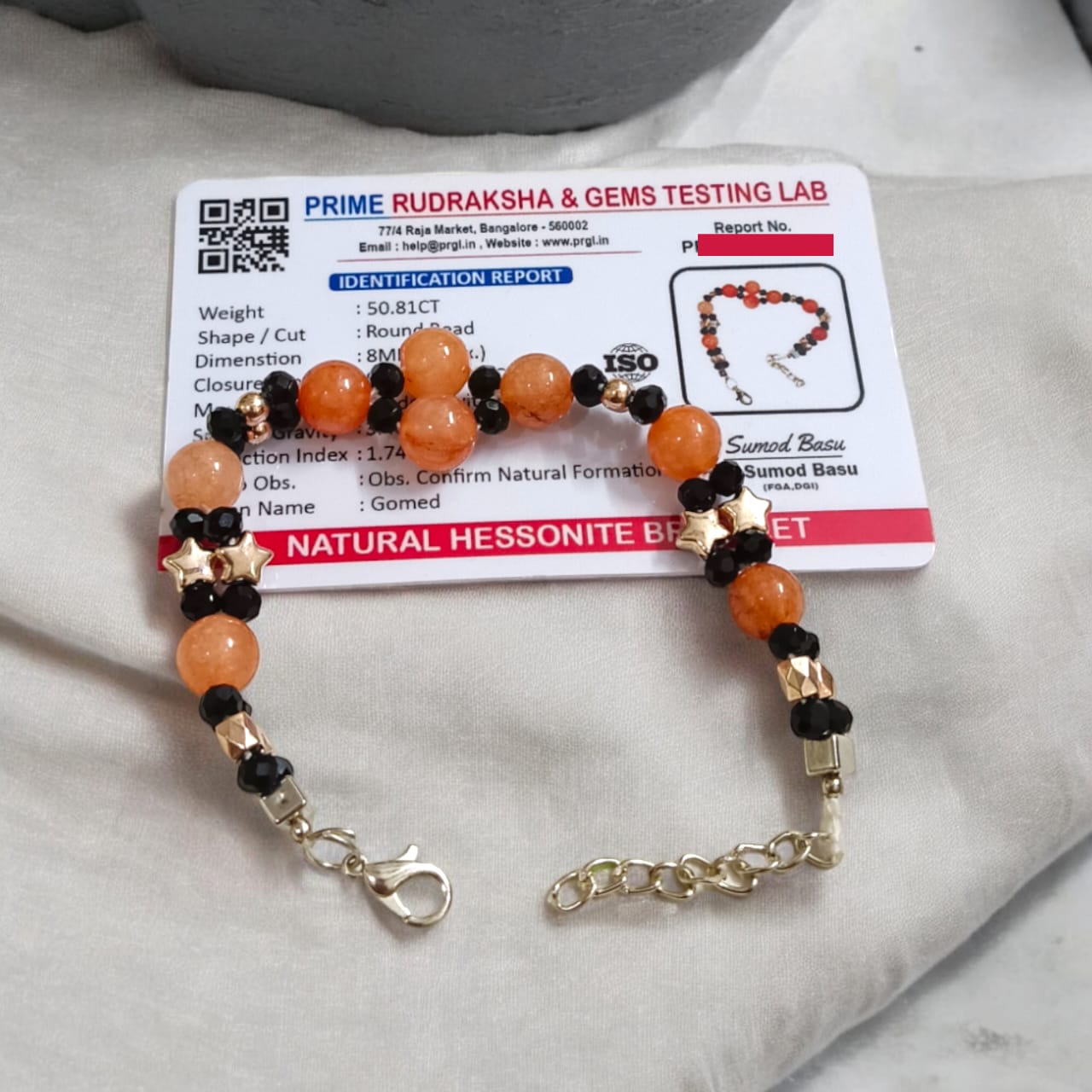 A lab-certified Hessonite (Gomed) bracelet with 8 MM beads and an adjustable lobster clasp, known for spiritual protection and Rahu's influence.