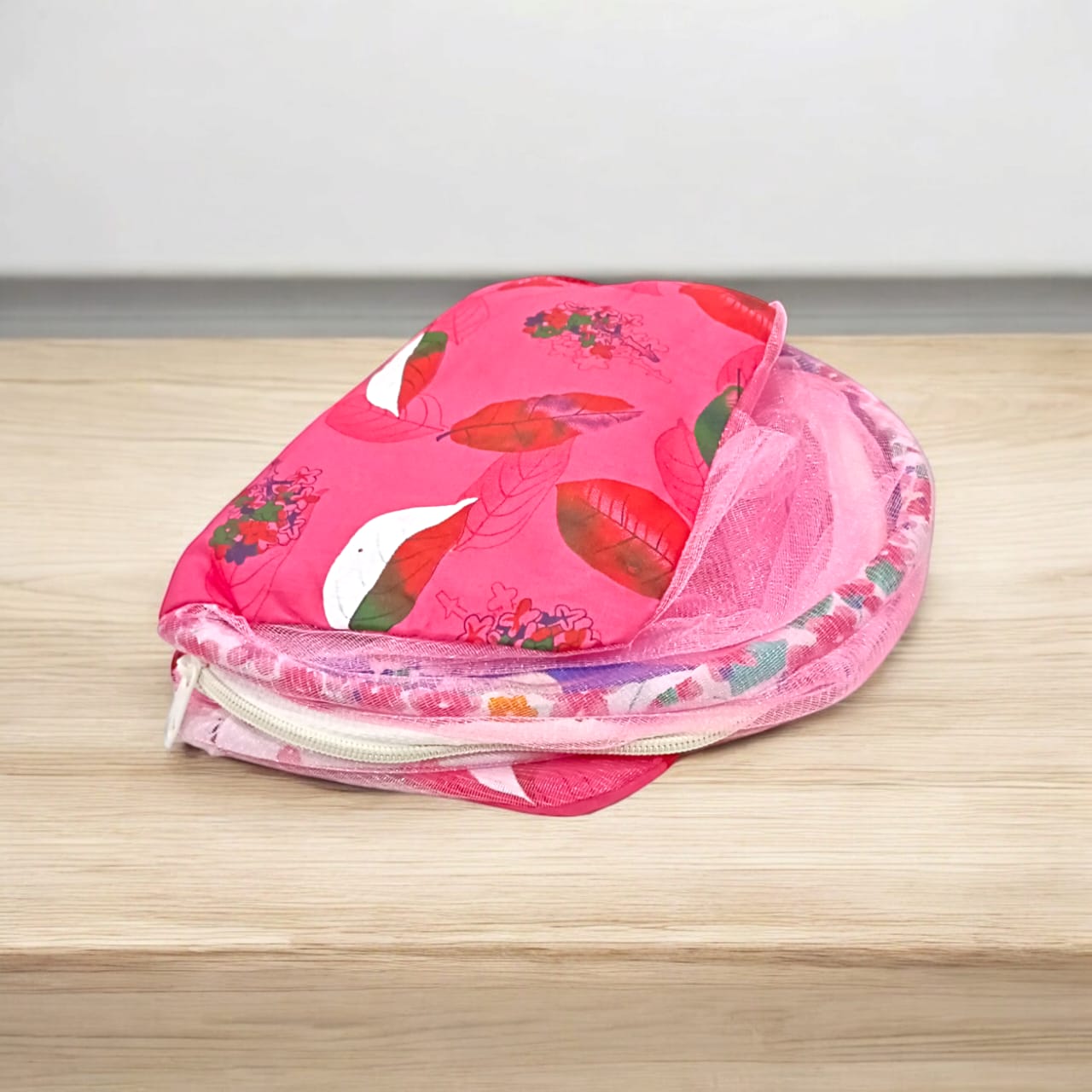 A large 10X13 inch comfortable bed with a mosquito net and three pillows, designed for Laddu Gopal or Radha Rani, available in Pink and Blue for home temple use.