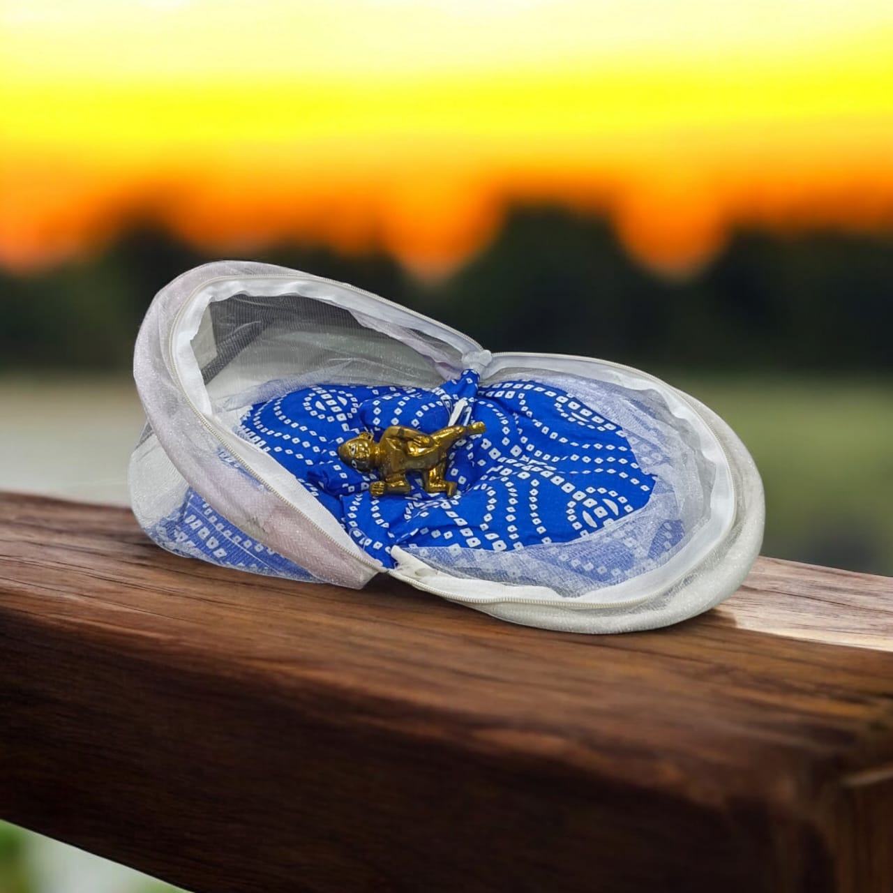 A large 10X13 inch comfortable bed with a mosquito net and three pillows, designed for Laddu Gopal or Radha Rani, available in Pink and Blue for home temple use.