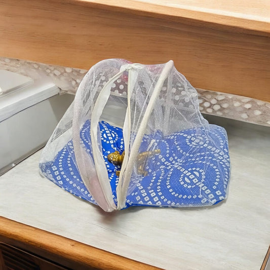 A large 10X13 inch comfortable bed with a mosquito net and three pillows, designed for Laddu Gopal or Radha Rani, available in Pink and Blue for home temple use.
